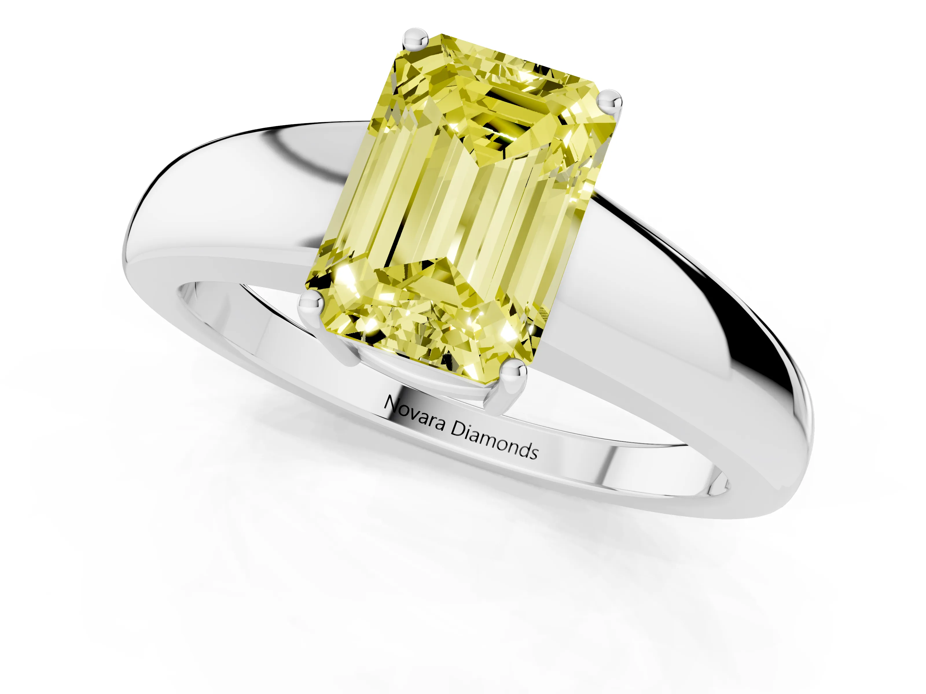 Fancy Yellow Emerald Cut Diamond Solitaire Ring Set in White gold with Tapered Band and Prong Setting