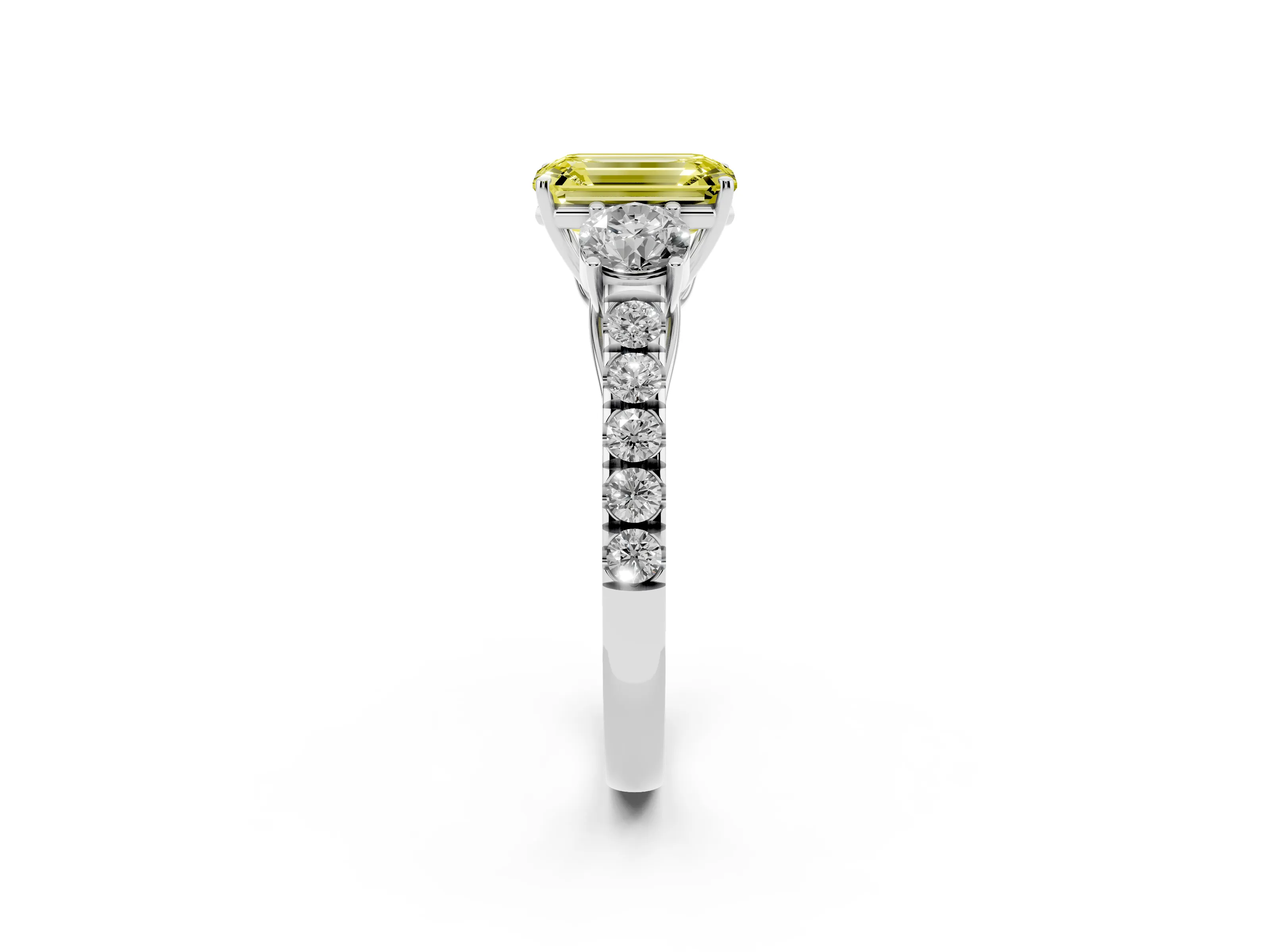 Fancy Yellow Emerald Cut Diamond Three-Stone Ring Set in White gold with Round Side Stones and Delicate Pavé Band