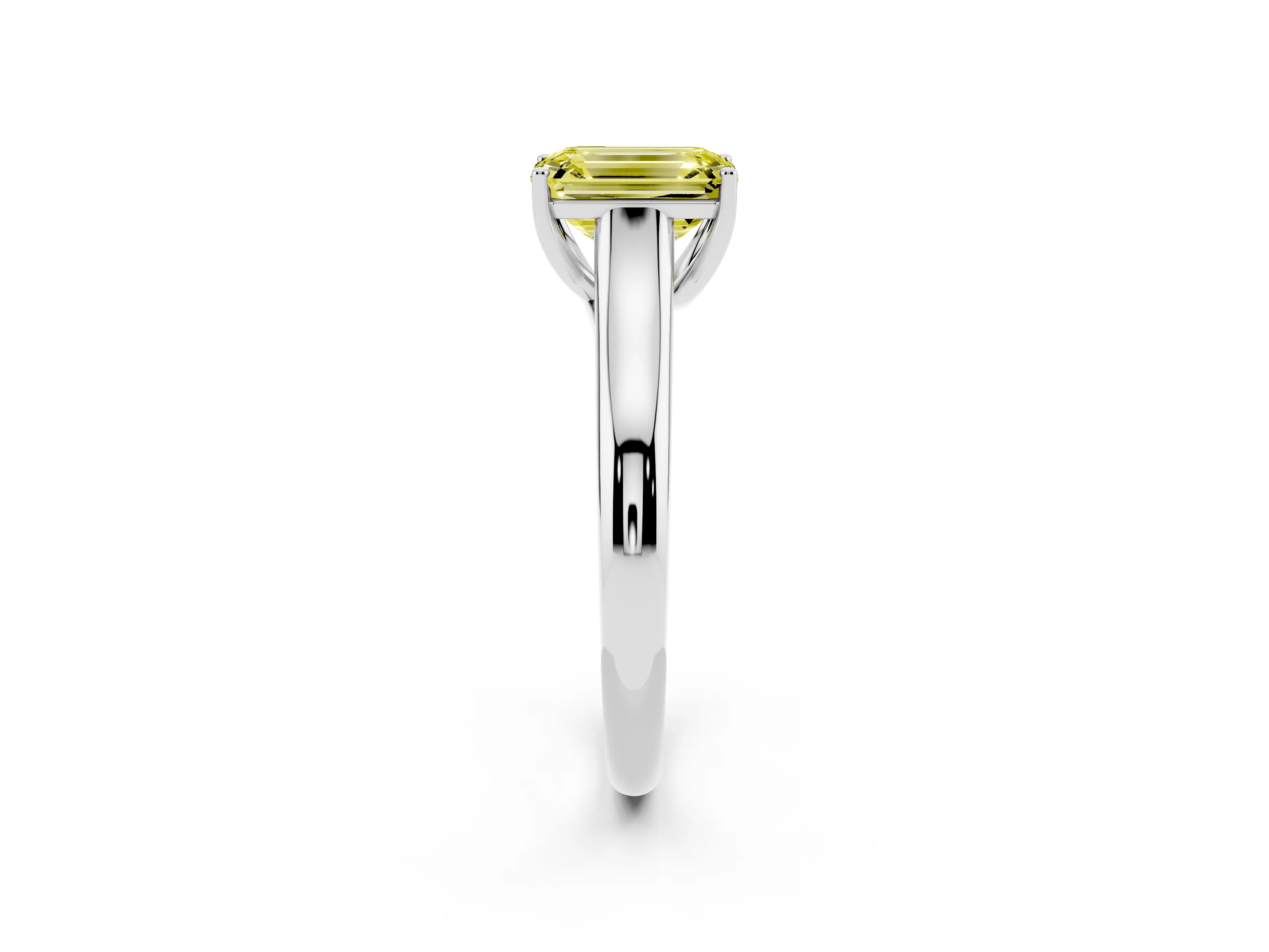 Fancy Yellow Emerald Cut Diamond Solitaire Engagement Ring Set in White gold with Subtly Tapered Band and Prong Setting