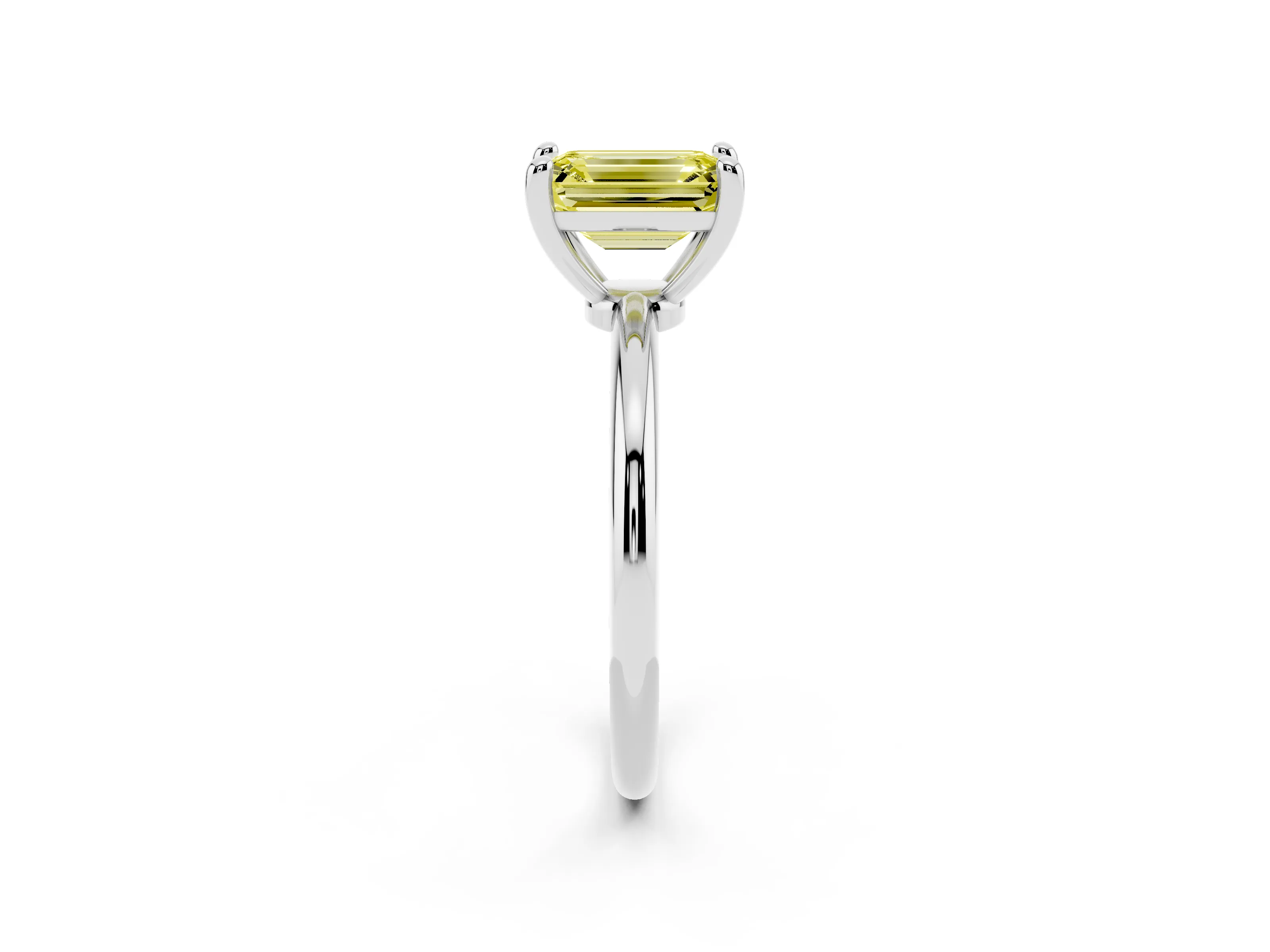 Fancy Yellow Emerald Cut Diamond Solitaire Ring Set in White gold with Secure Prong Setting on a Classic Band