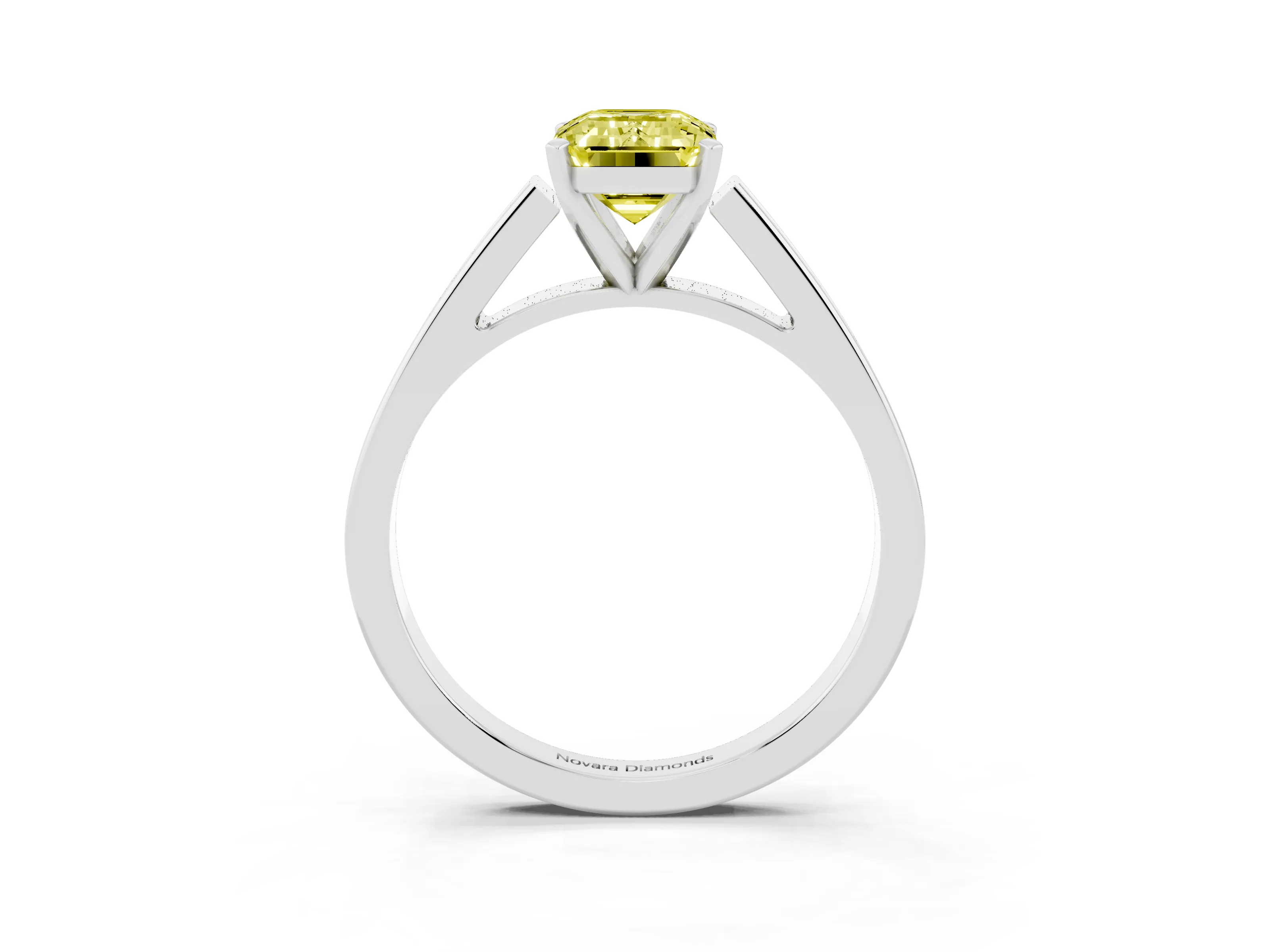 Fancy Yellow Emerald Cut Diamond Solitaire Engagement Ring Set in White gold with Prong Setting and Tapered Band
