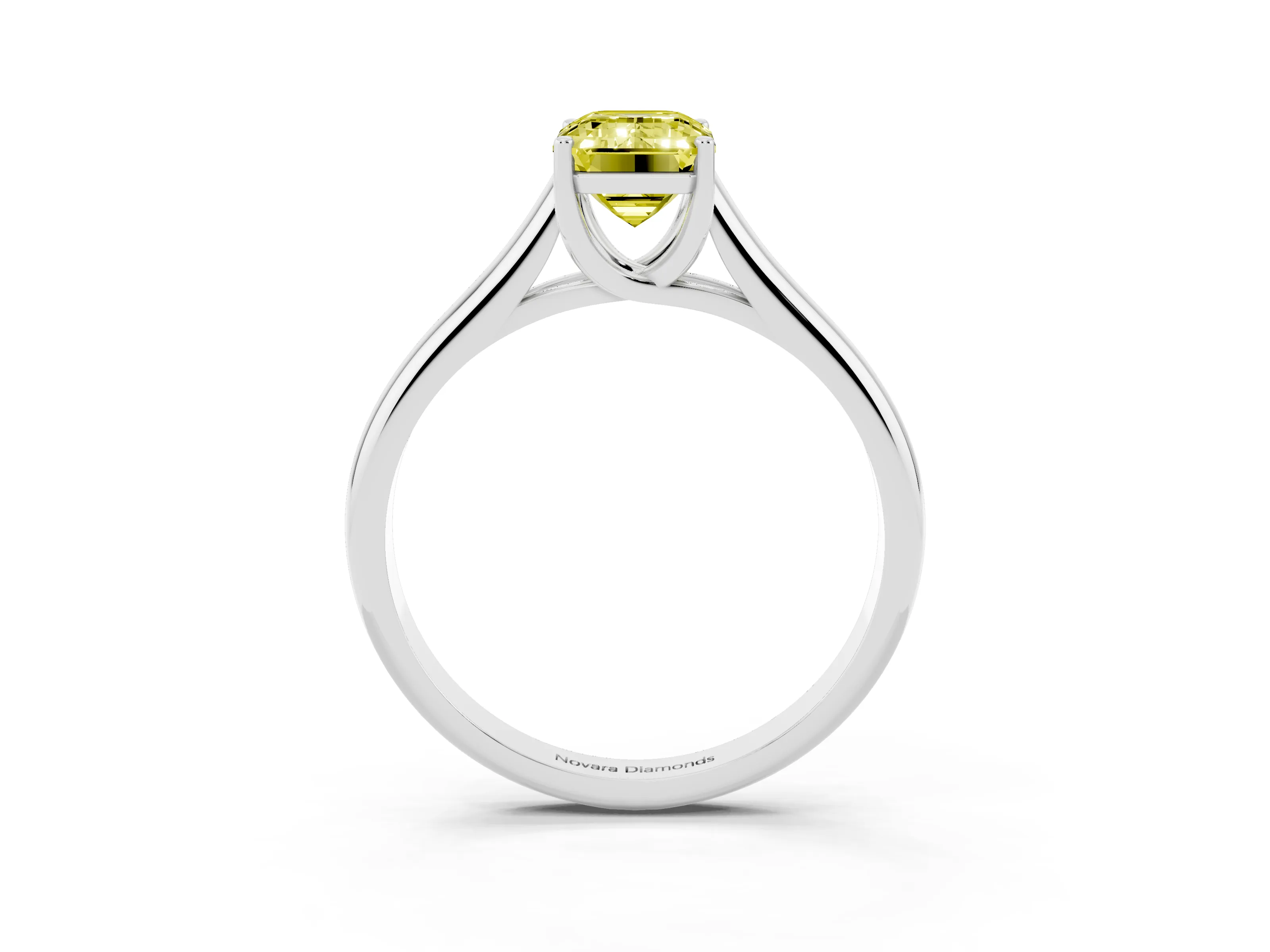 Fancy Yellow Emerald Cut Diamond Solitaire Engagement Ring Set in White gold with Subtly Tapered Band and Prong Setting