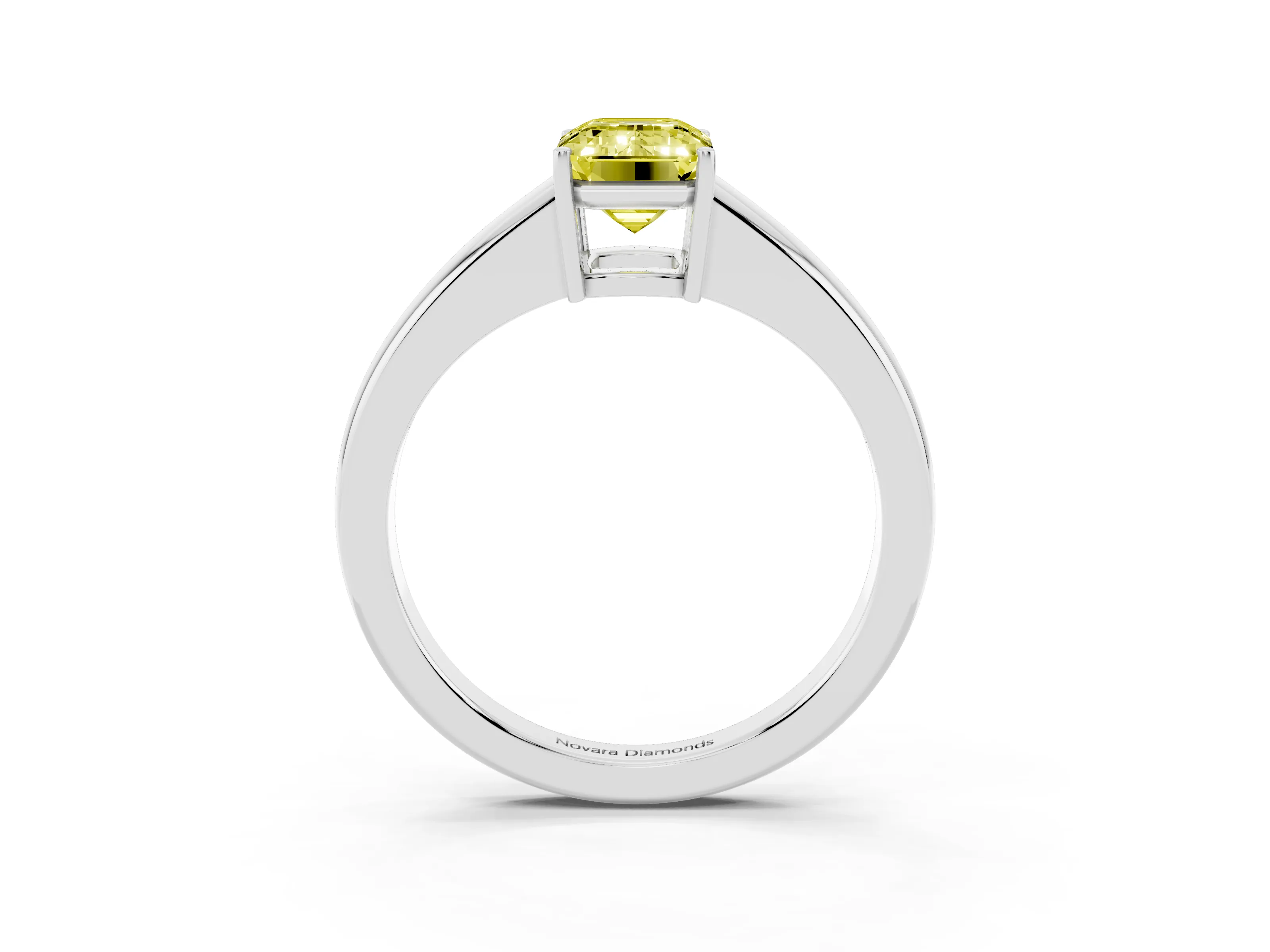 Fancy Yellow Emerald Cut Diamond Solitaire Ring Set in White gold with Tapered Band and Prong Setting