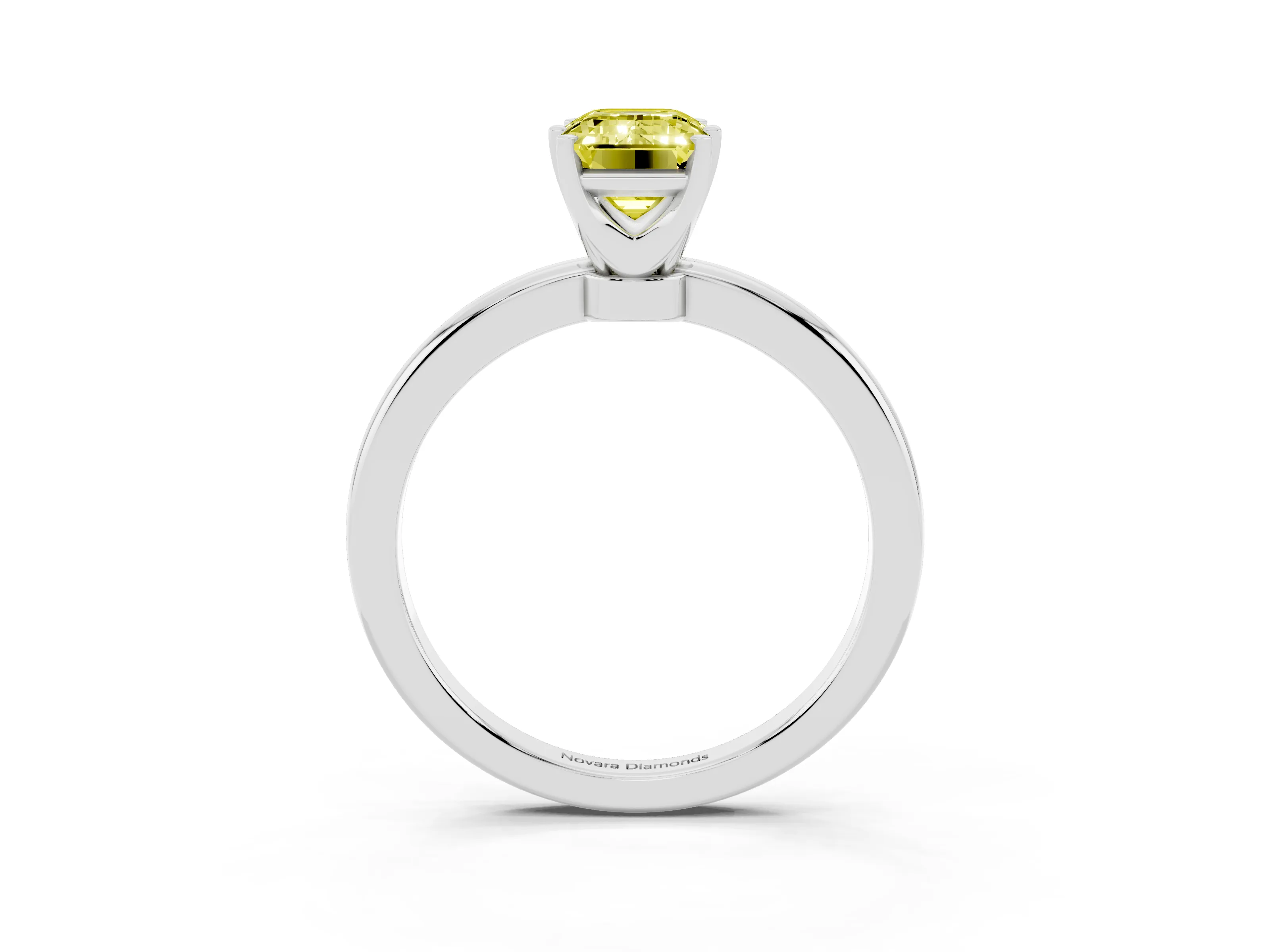 Fancy Yellow Emerald Cut Diamond Solitaire Ring Set in Platinum with Raised Prong Setting on a Classic Band