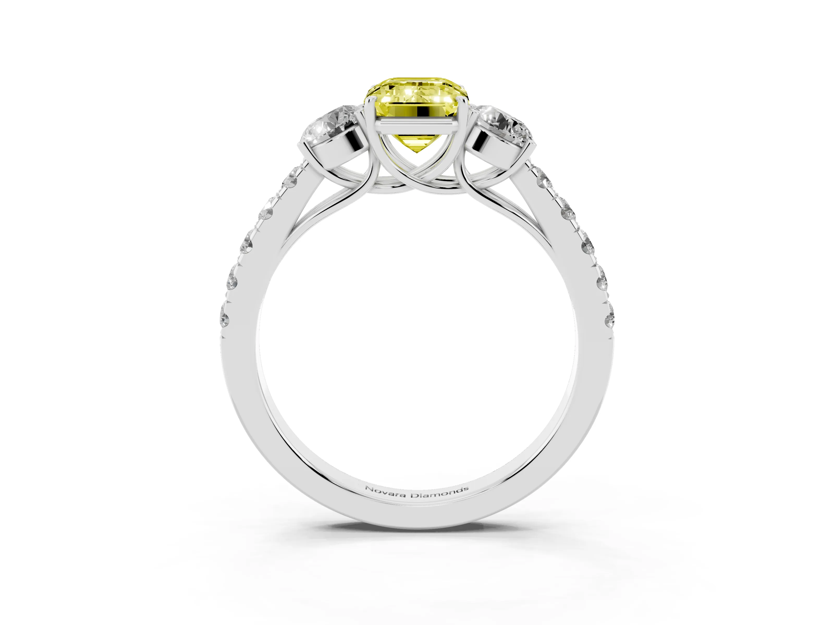 Fancy Yellow Emerald Cut Diamond Three-Stone Ring Set in White gold with Round Side Stones and Delicate Pavé Band