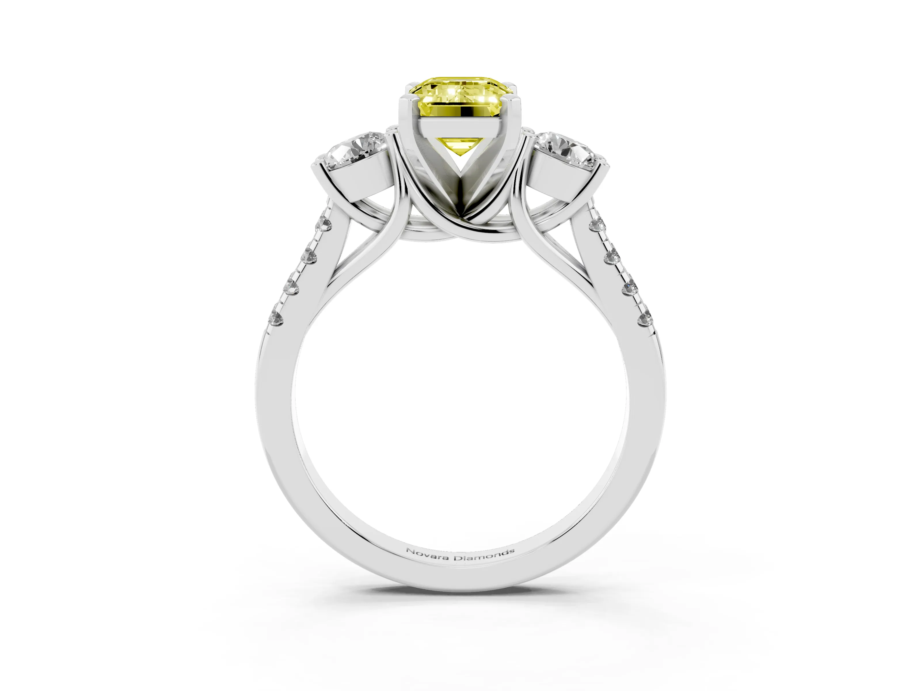 Fancy Yellow Three-Stone Emerald Cut Diamond Pavé Band Ring Set in White gold with Prong-Set Trio