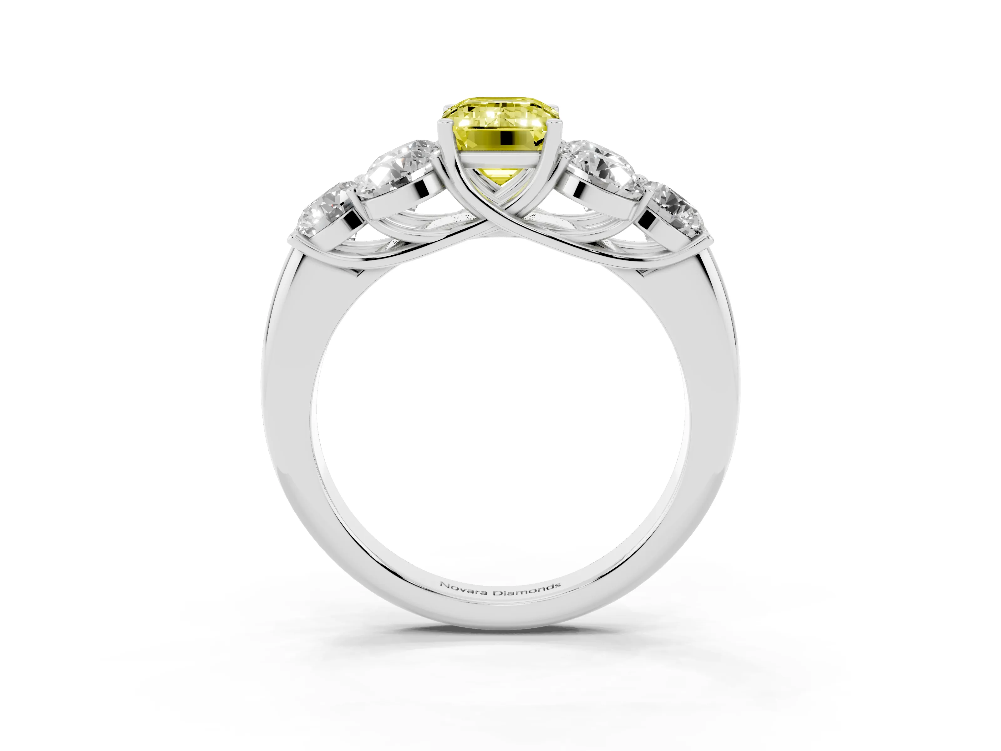 Fancy Yellow Emerald Cut Diamond Cluster Ring Set in White gold with Round Accent Stones and Prong Setting on a Plain Band