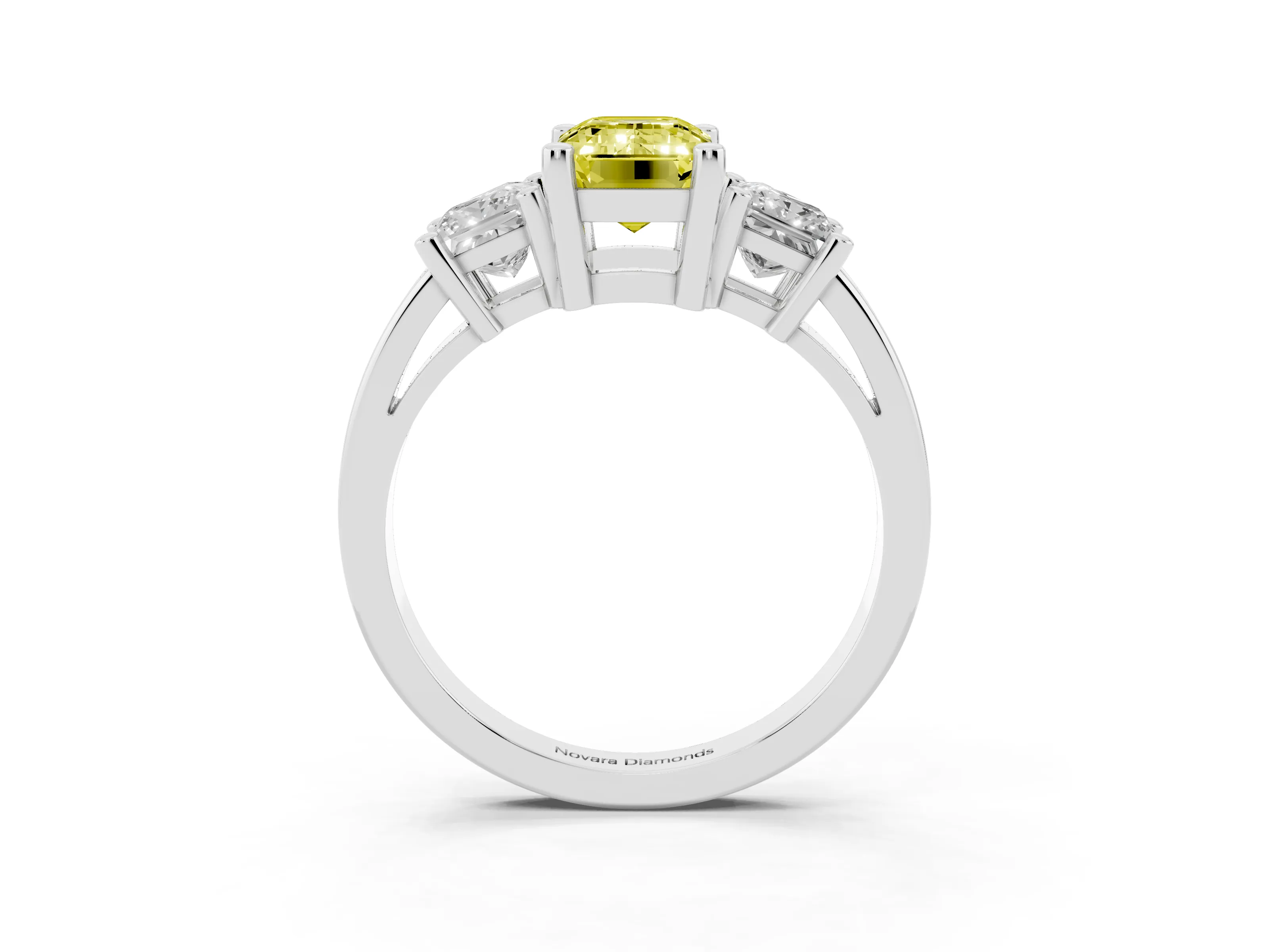 Fancy Yellow Three-Stone Emerald Cut Diamond Solitaire Ring Set in Platinum with Prong Setting