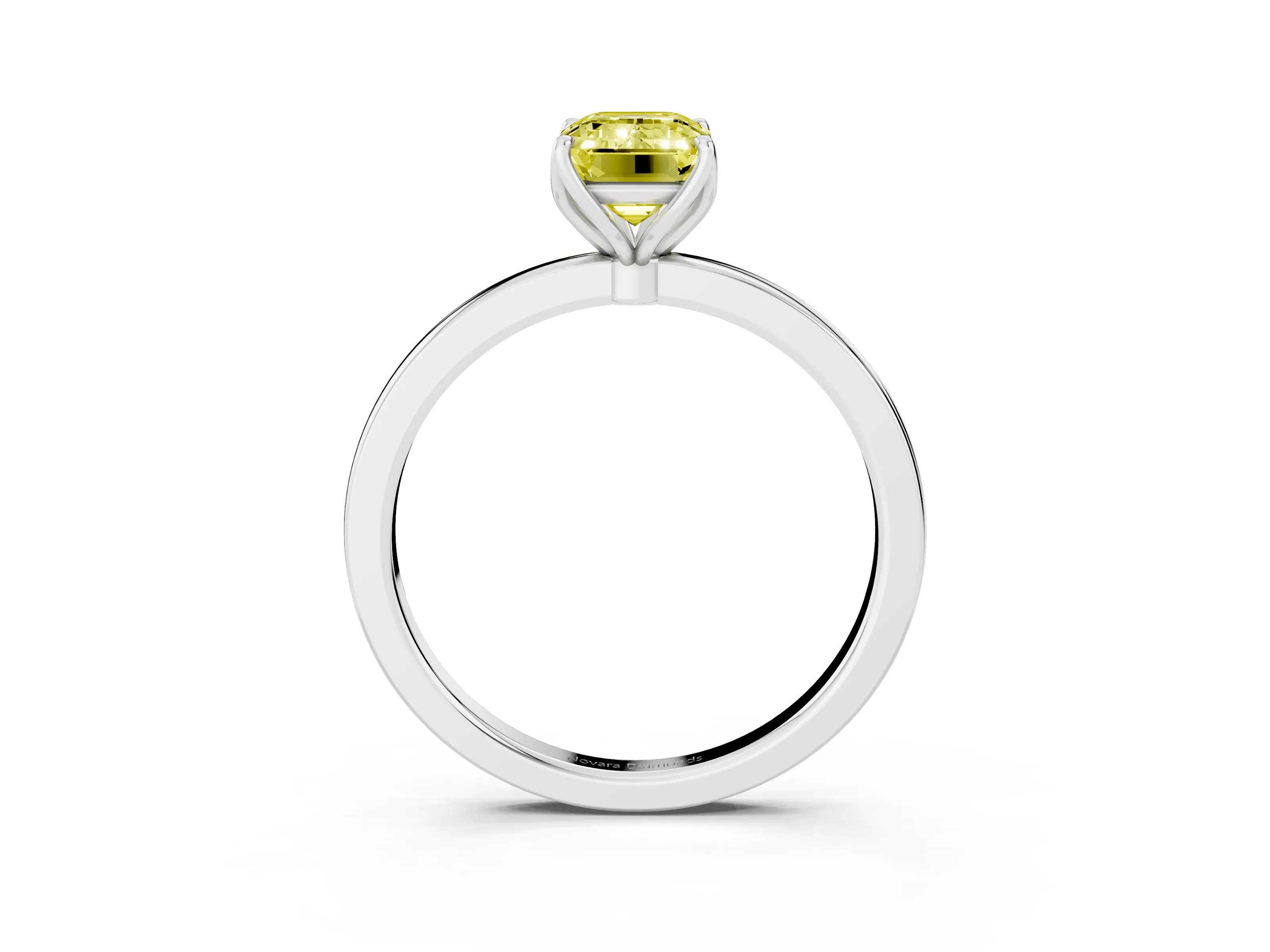 Fancy Yellow Emerald Cut Diamond Solitaire Ring Set in White gold with Prong Setting and Thin Polished Band