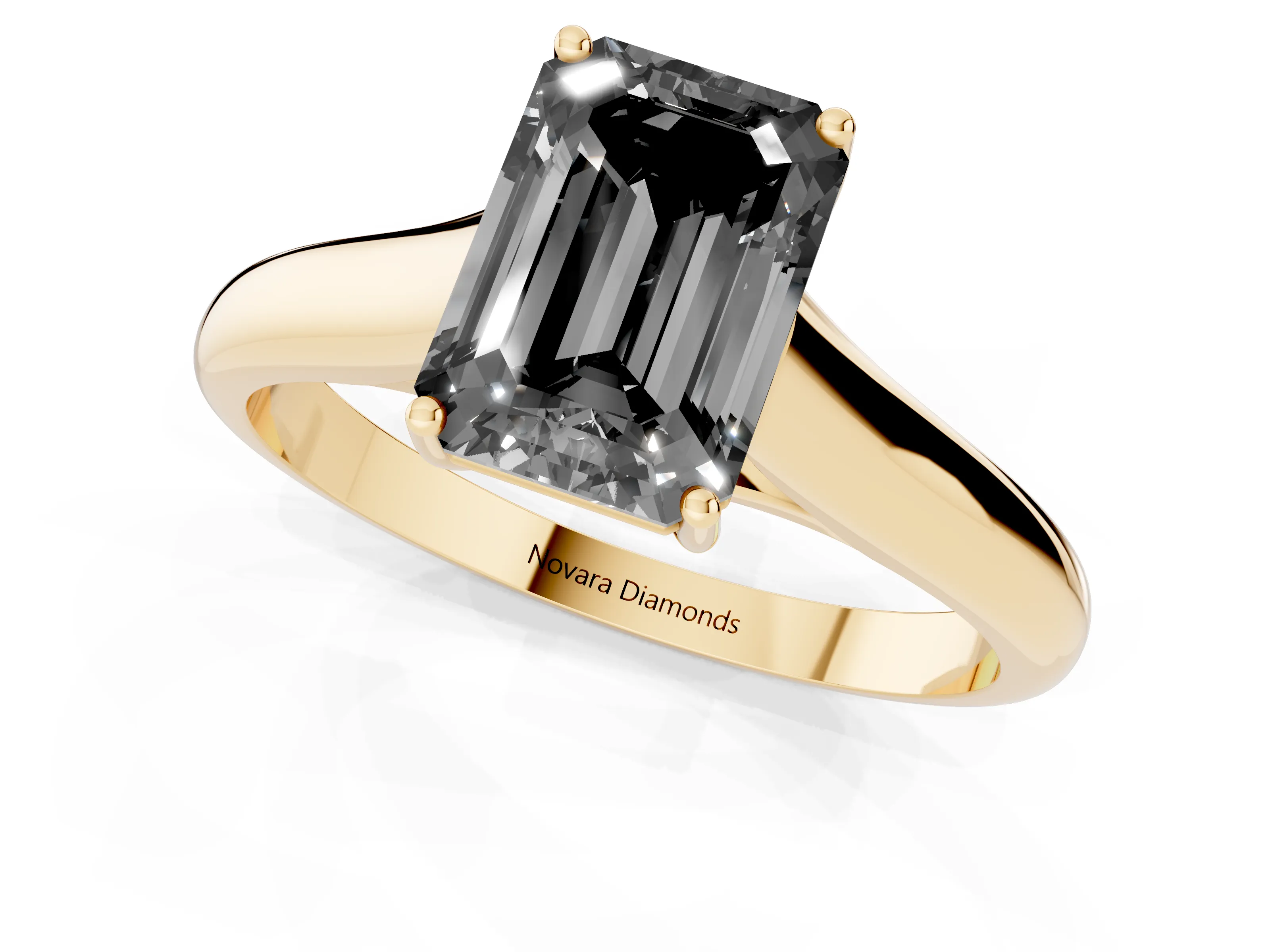 Fancy Black Emerald Cut Diamond Solitaire Engagement Ring Set in Yellow gold with Subtly Tapered Band and Prong Setting