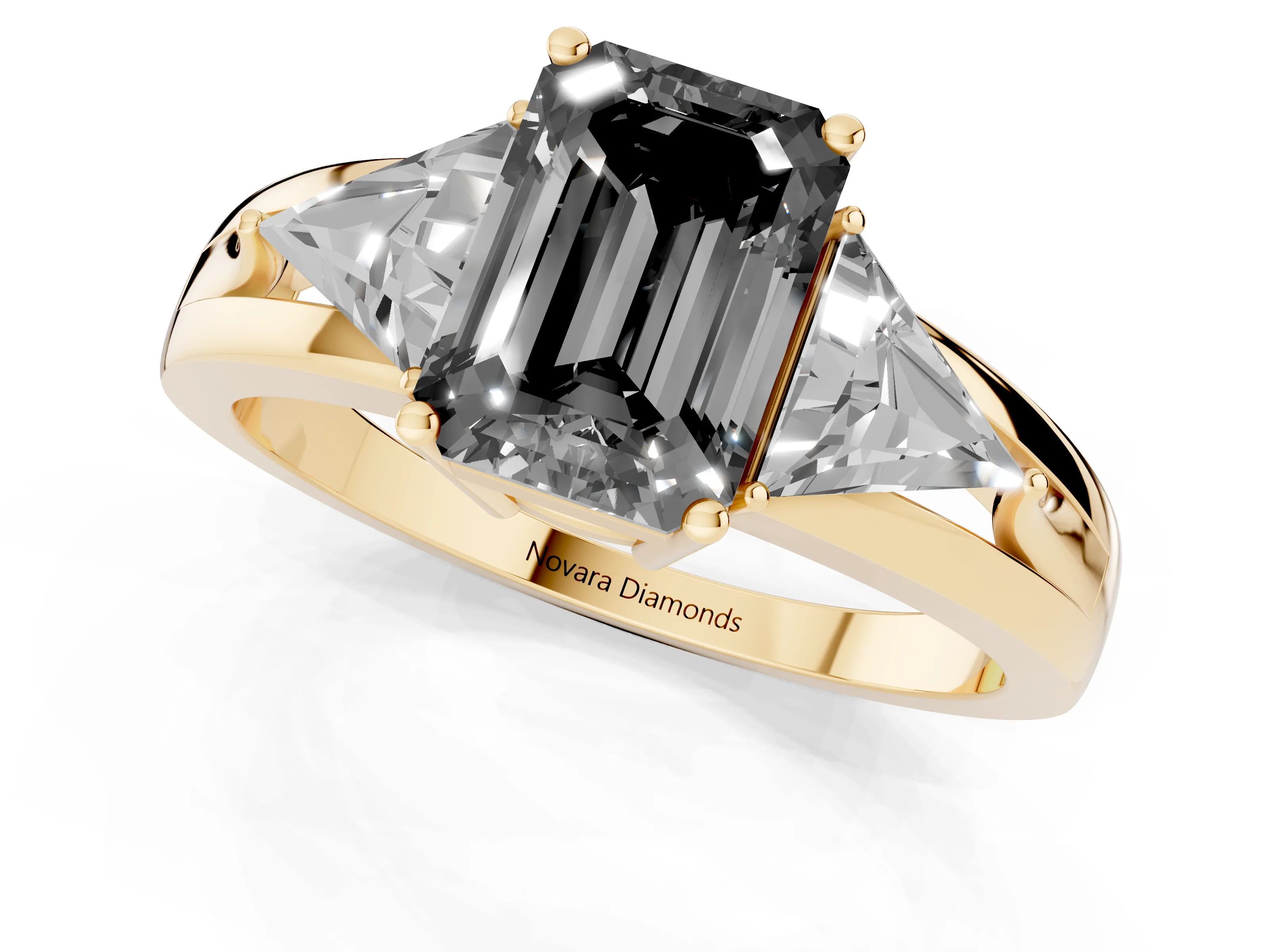 Fancy Black Emerald Cut Diamond Three-Stone Ring Set in Yellow gold with Trillion Side Stones and Split Shank