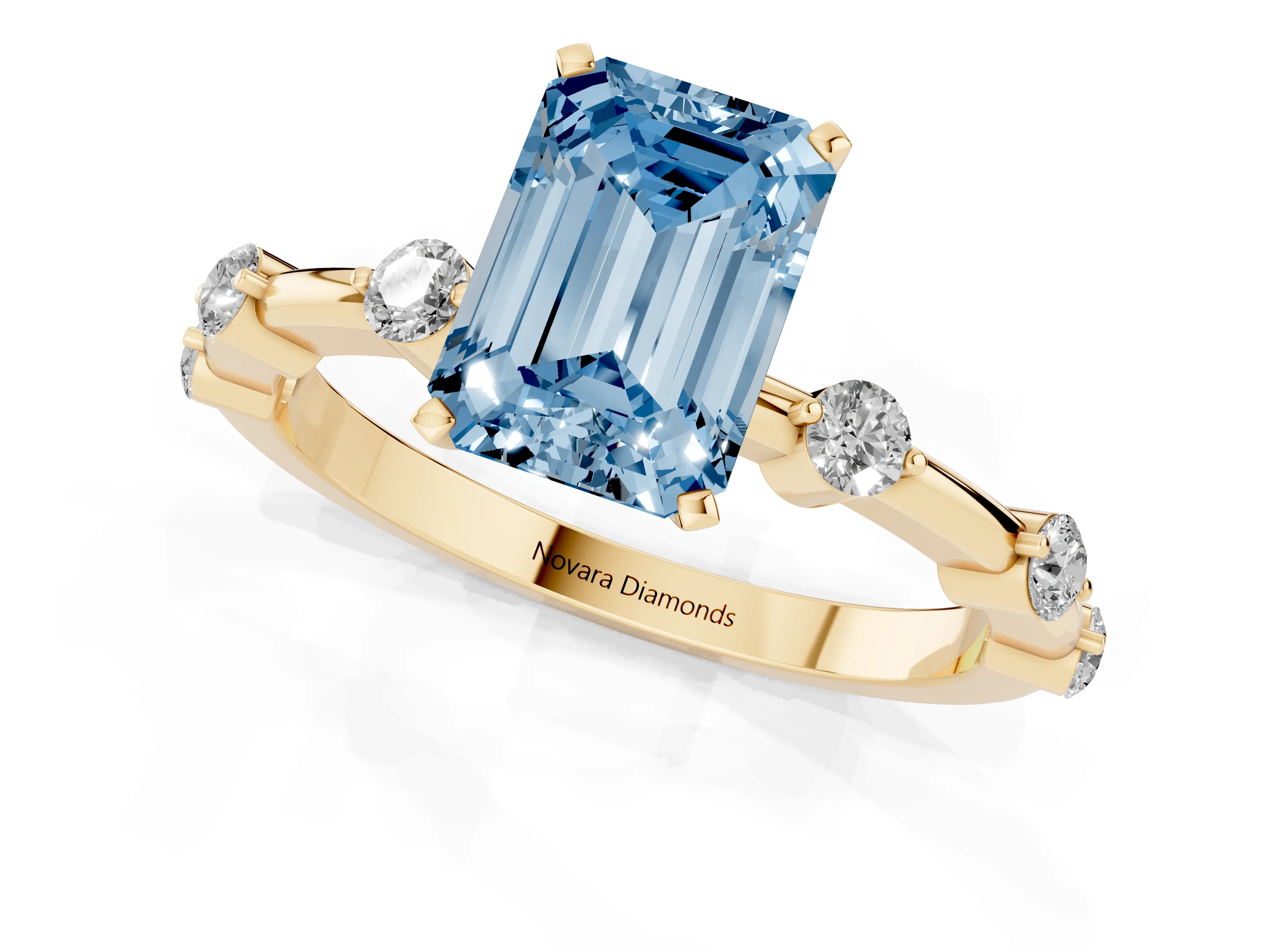 Fancy Blue Emerald Cut Diamond Solitaire Ring Set in Yellow gold with Bezel Set Side Stones and Prong Setting