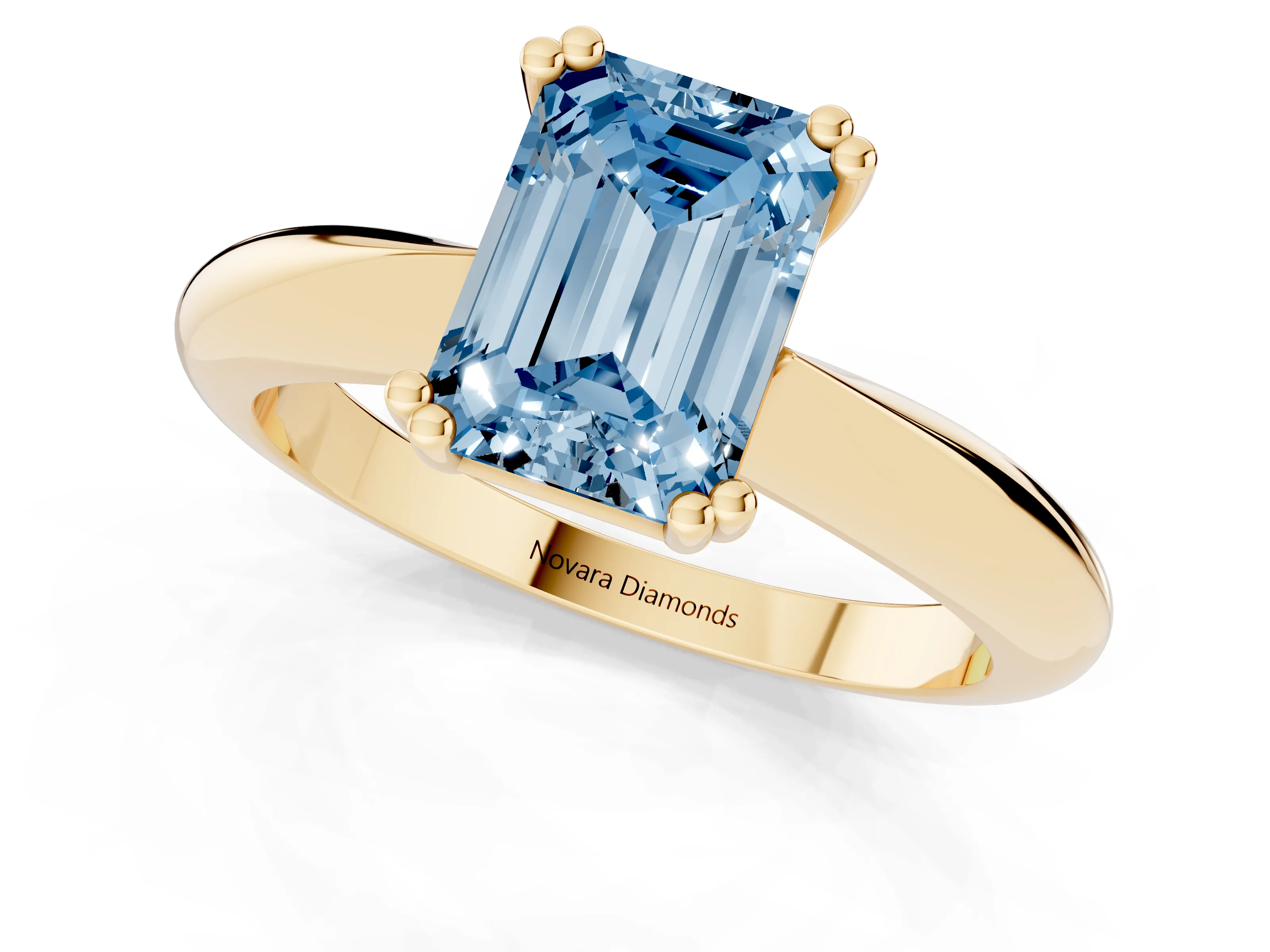 Fancy Blue Emerald Cut Diamond Solitaire Engagement Ring Set in Yellow gold with Tapered Band and Prong Setting