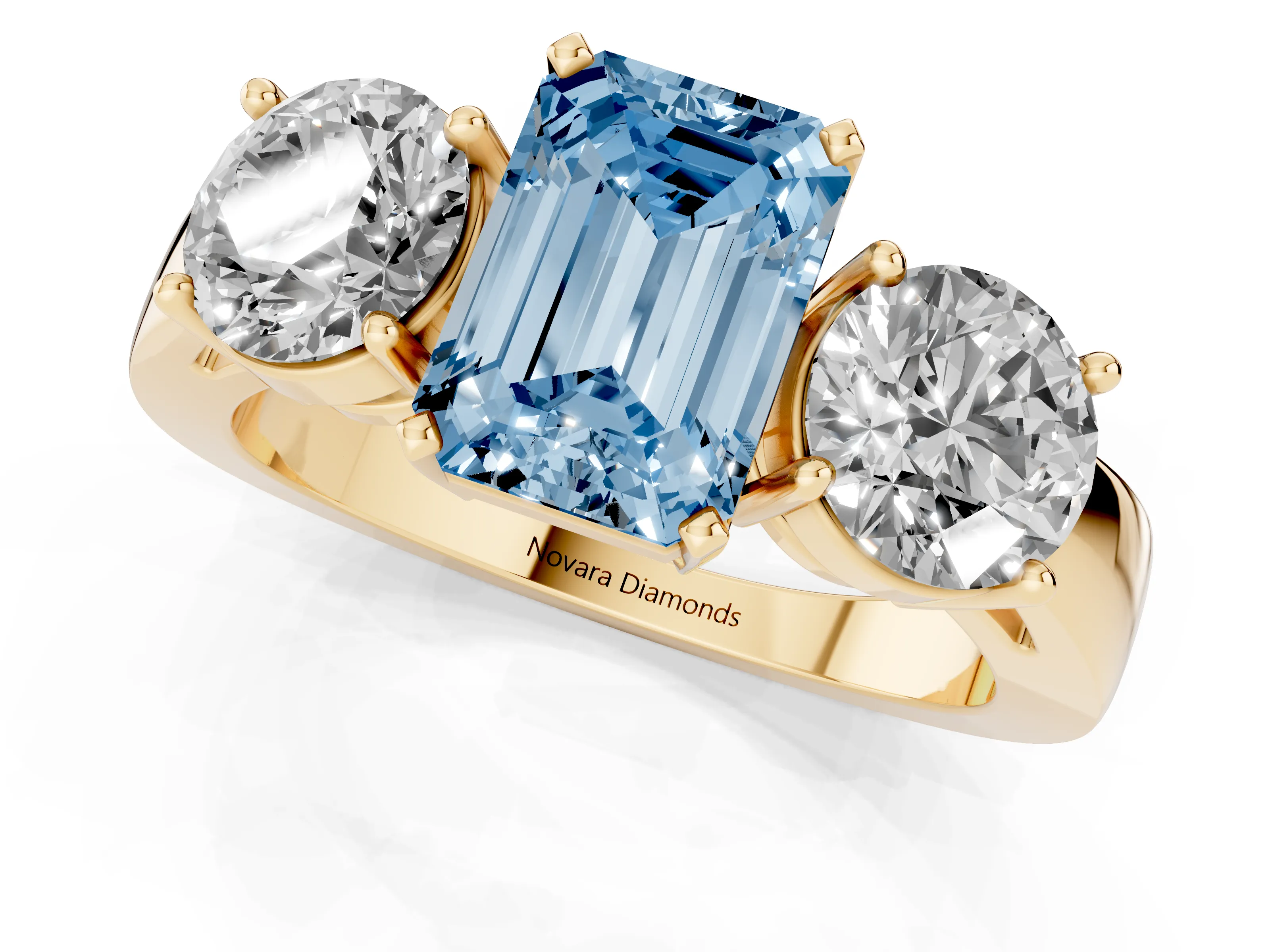 Fancy Blue Emerald Cut Diamond Three-Stone Ring Set in Yellow gold with Round Side Stones and Classic Band