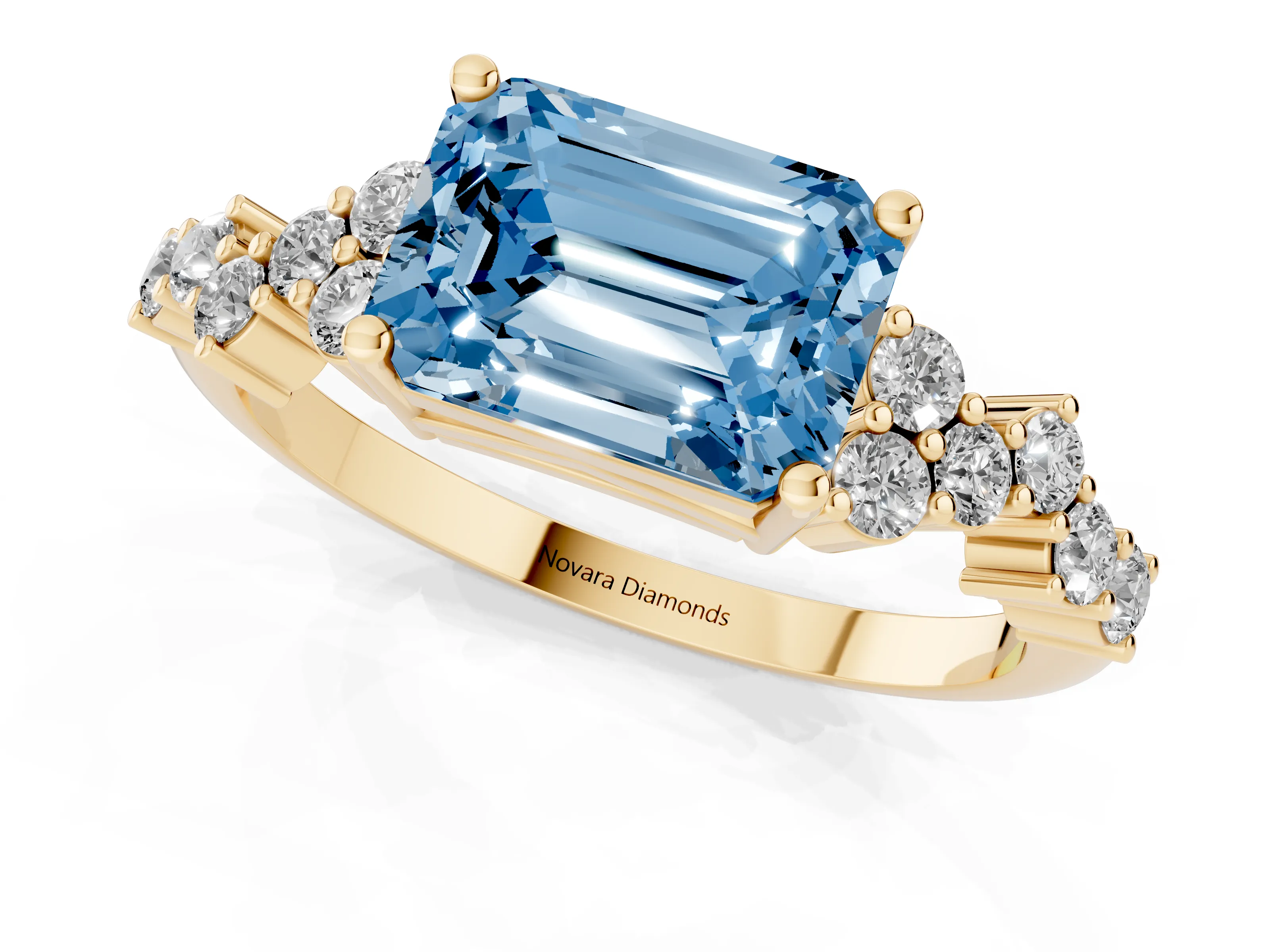 Fancy Blue Emerald Cut Diamond Ring Set in Yellow gold with Scattered Round Accents