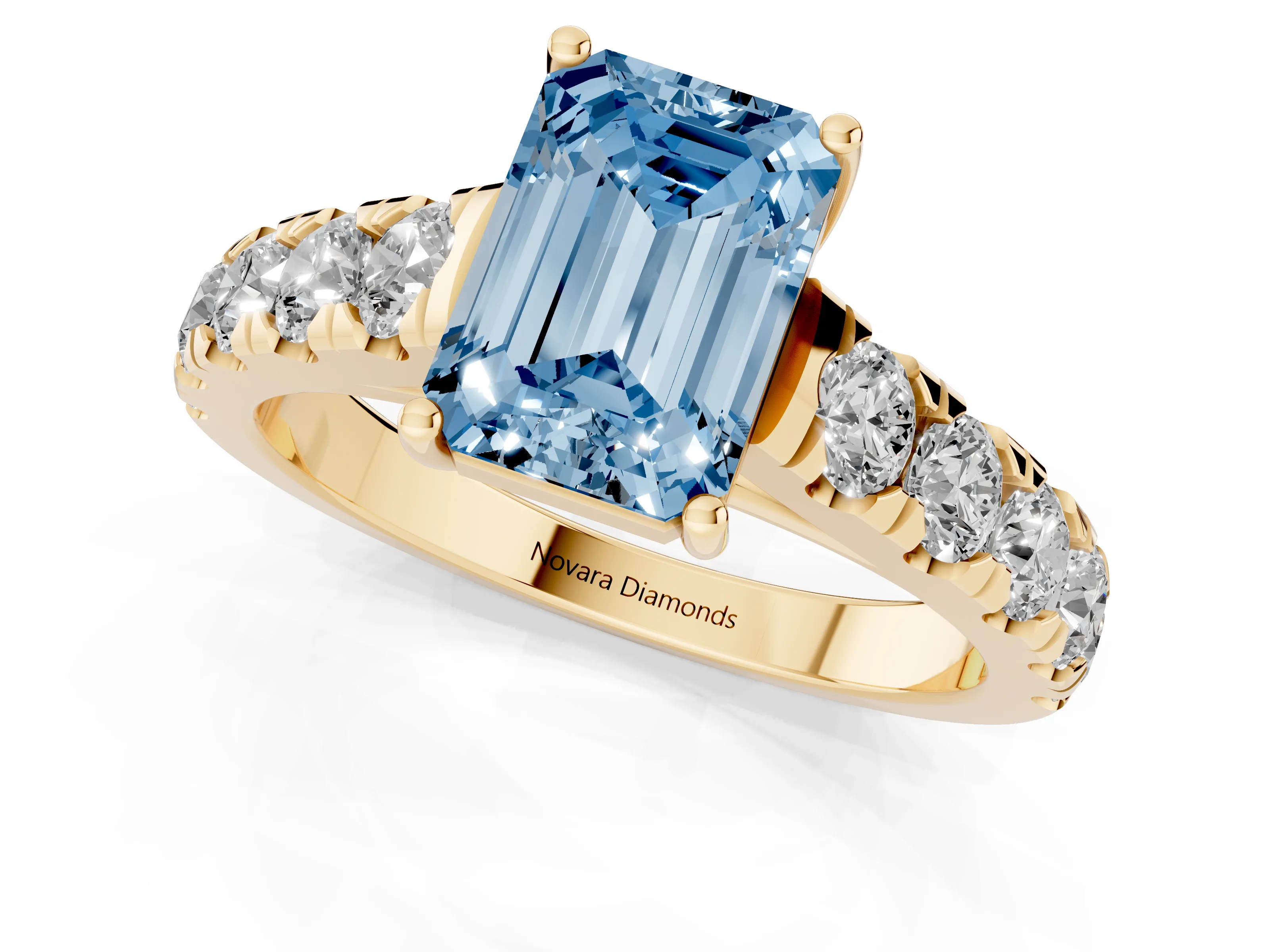 Fancy Blue Emerald Cut Diamond Solitaire Ring Set in Yellow gold with Cut-Down Micro Pavé Band and Prong Setting