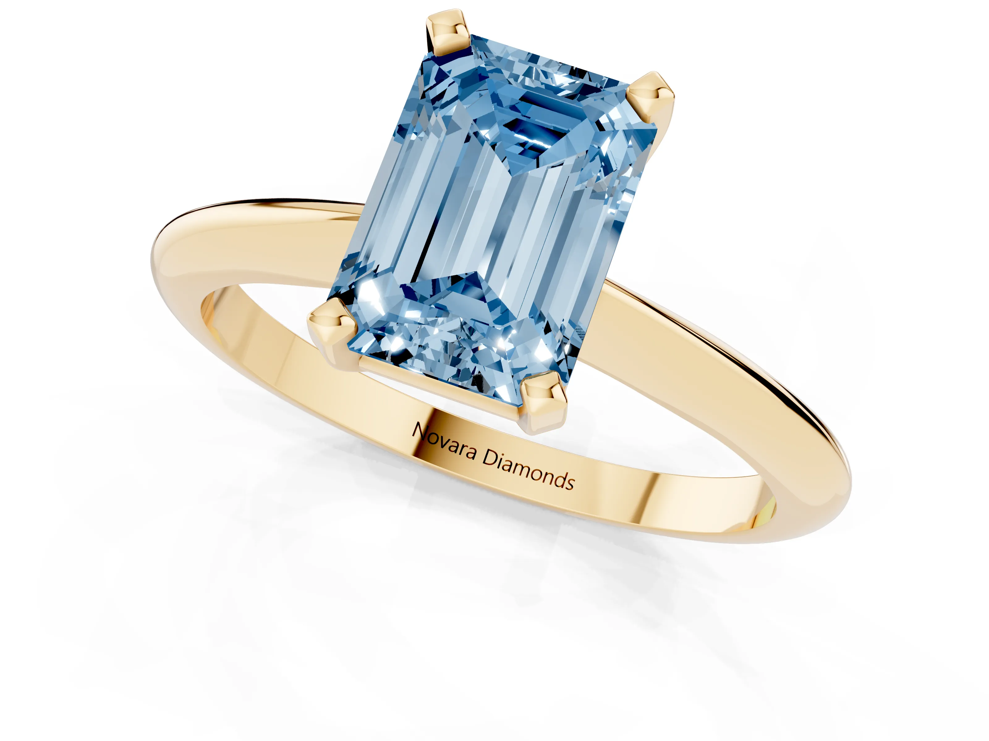 Fancy Blue Emerald Cut Diamond Solitaire Ring Set in Yellow gold with Prong Setting on a Plain Round Band