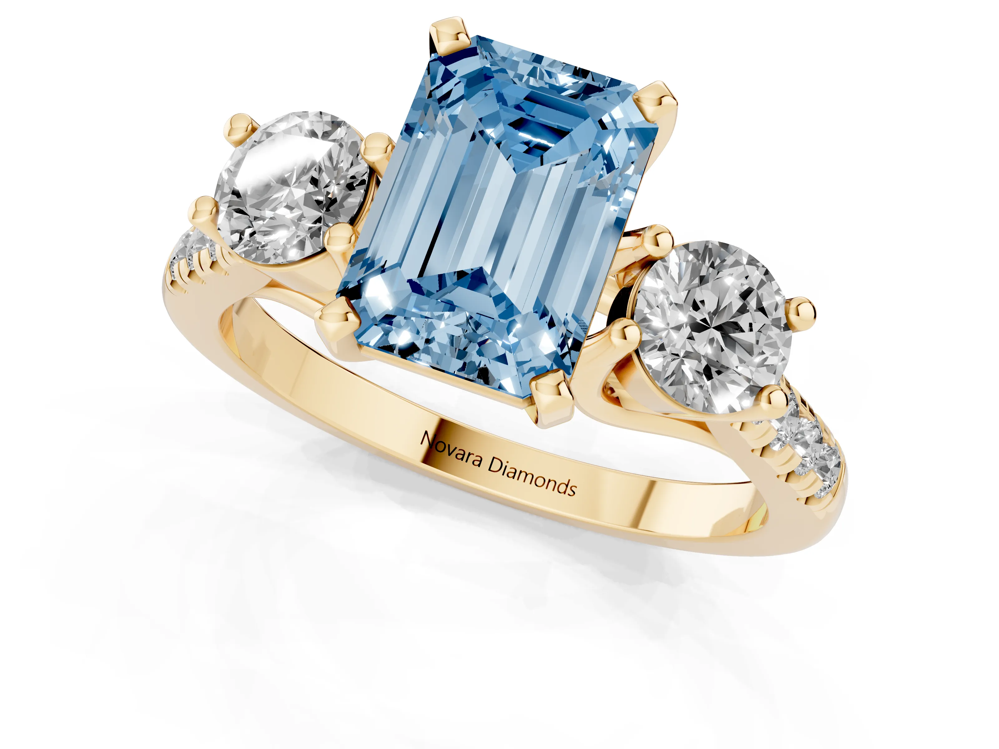Fancy Blue Three-Stone Emerald Cut Diamond Pavé Band Ring Set in Yellow gold with Prong-Set Trio