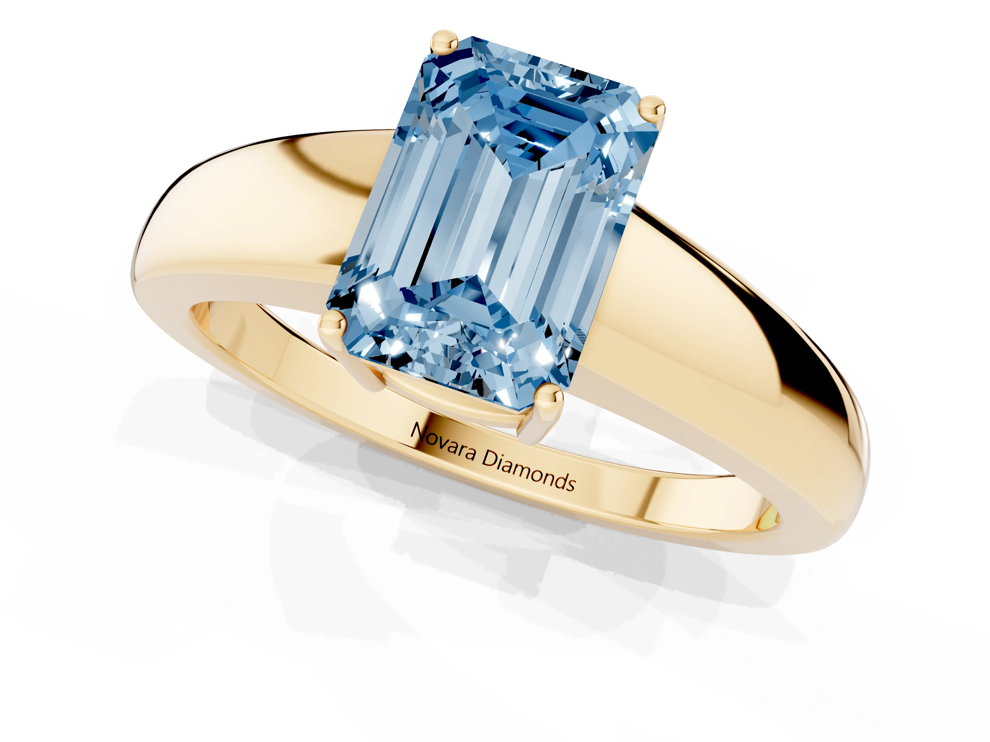 Fancy Blue Emerald Cut Diamond Solitaire Ring Set in Yellow gold with Tapered Band and Prong Setting