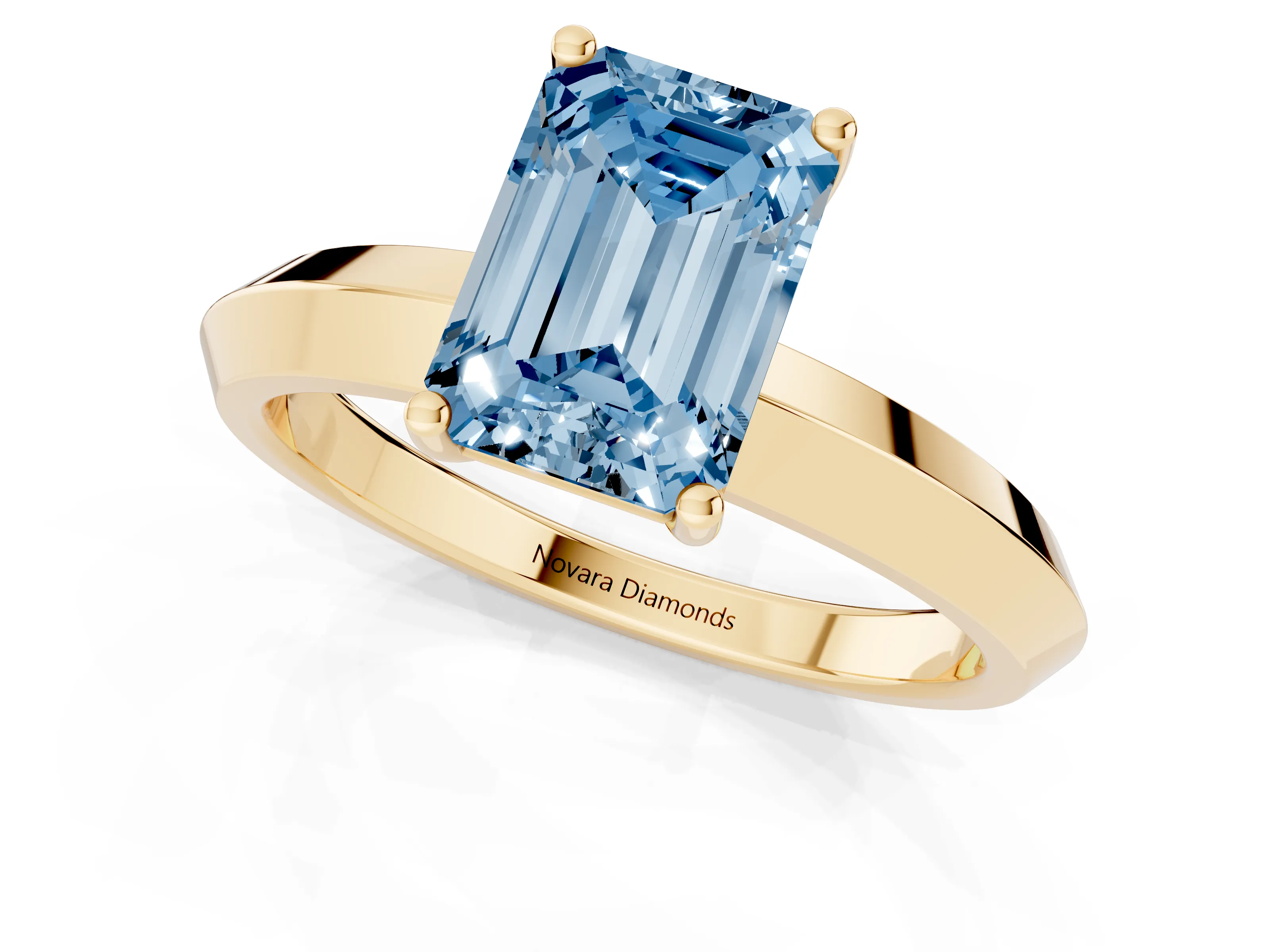 Fancy Blue Emerald Cut Diamond Solitaire Engagement Ring Set in Yellow gold with Flat Band and Prong Setting