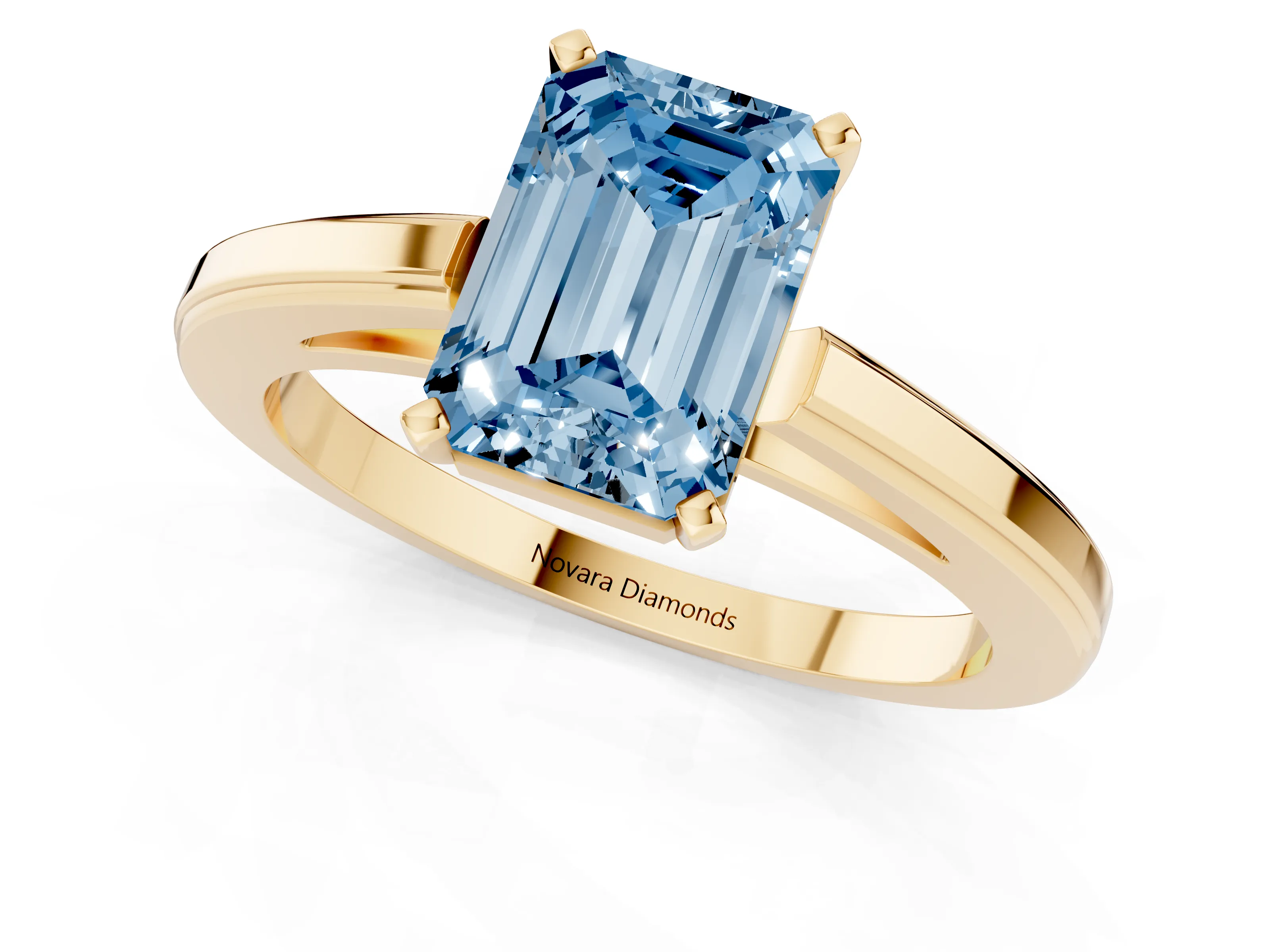 Fancy Blue Emerald Cut Diamond Solitaire Ring Set in Yellow gold with Prong Setting and Classic Band