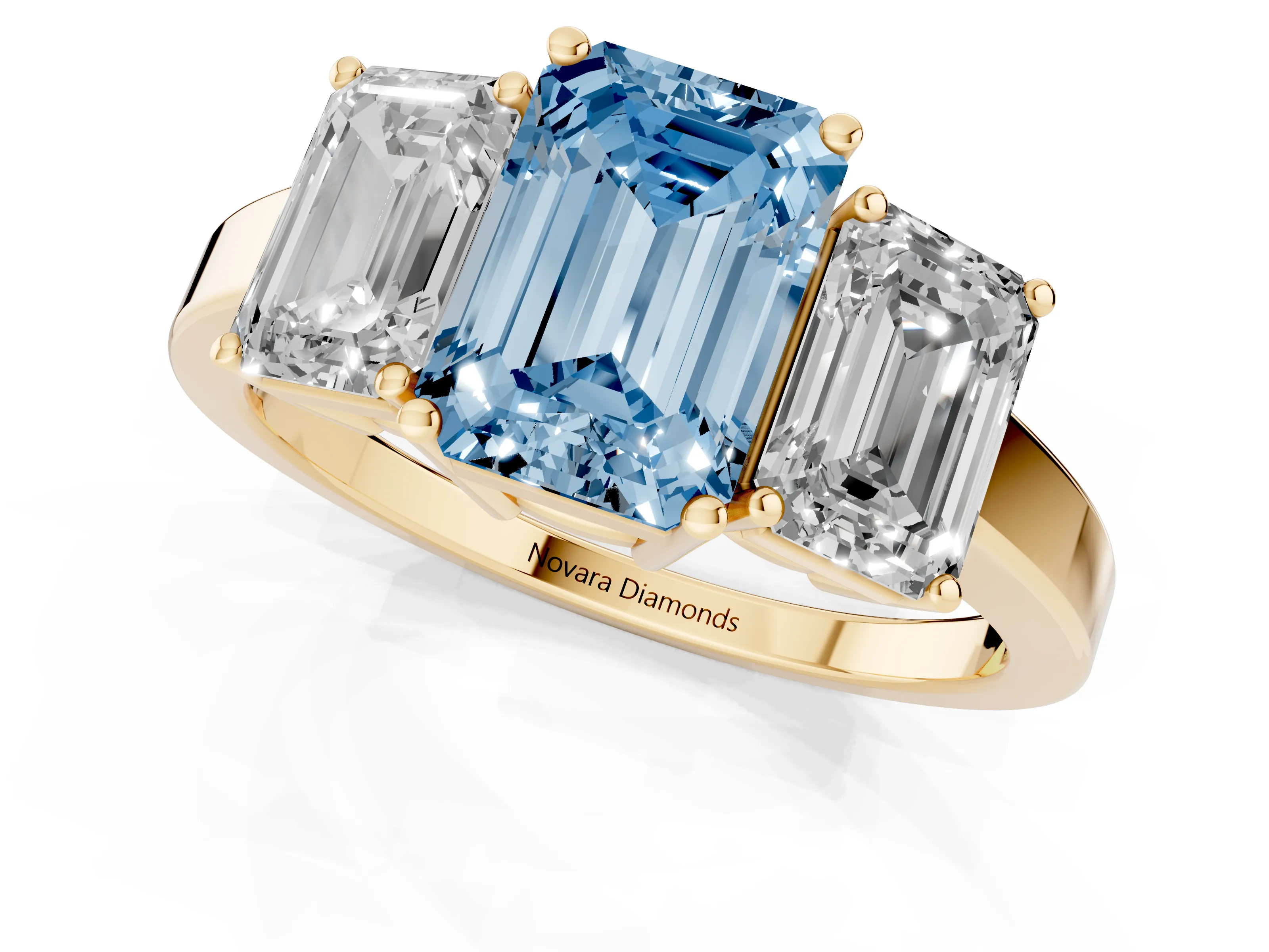 Fancy Blue Emerald Cut Diamond Three-Stone Engagement Ring Set in Yellow gold with Flat Band