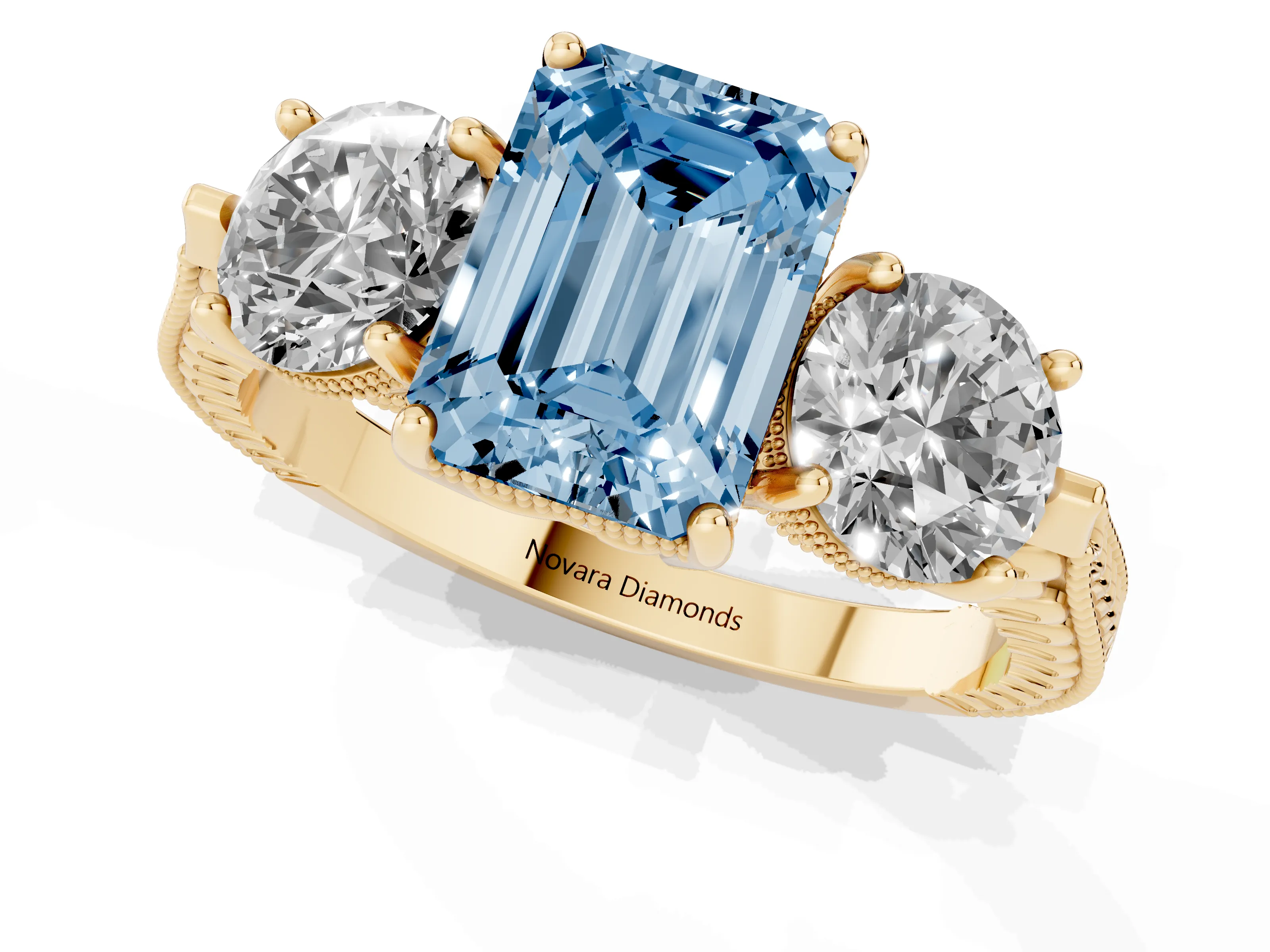 Fancy Blue Emerald Cut Diamond Three-Stone Ring Set in Yellow gold with Milgrain Band