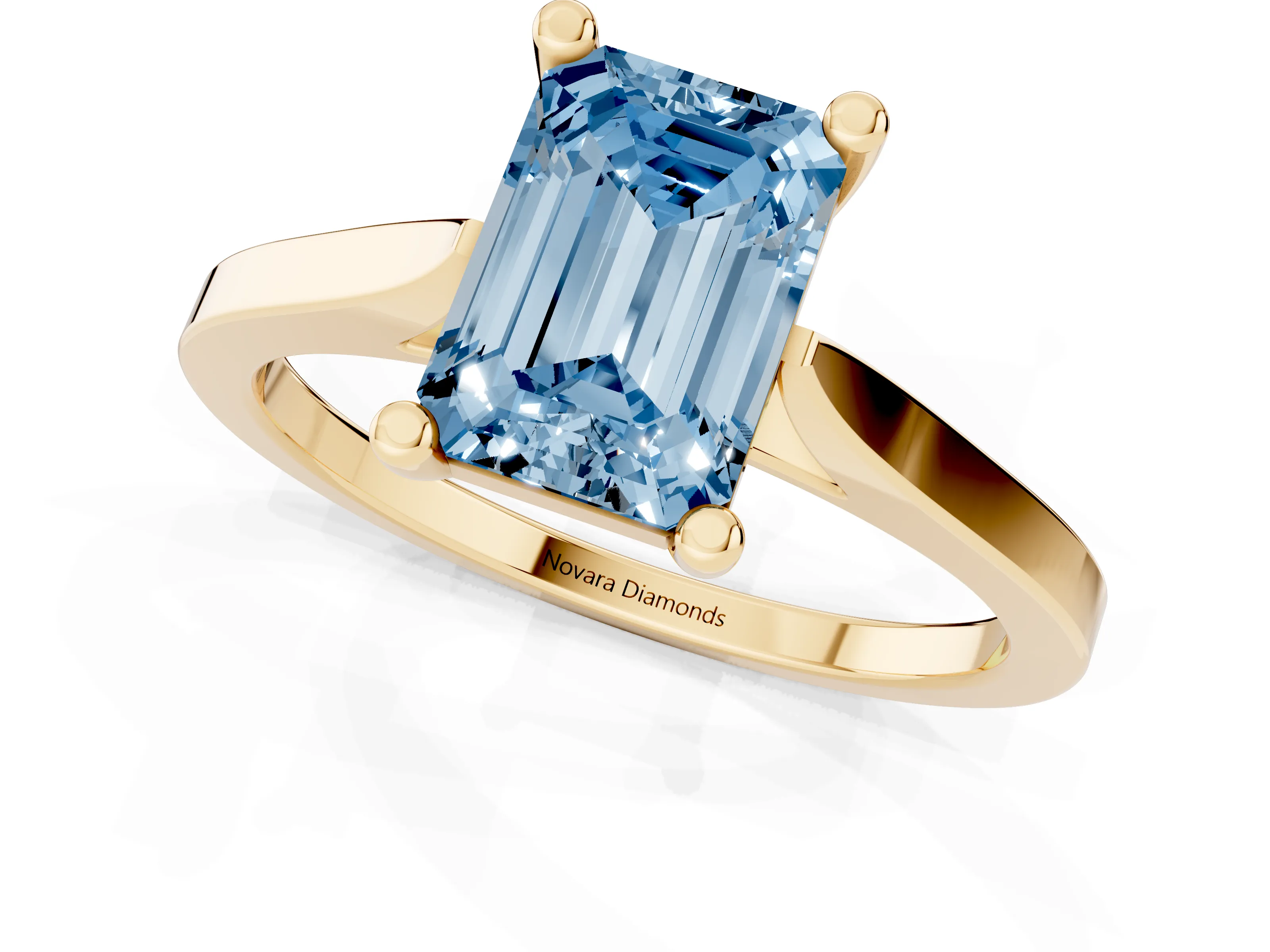 Fancy Blue Emerald Cut Diamond Solitaire Ring Set in Yellow gold with Prong Setting and Tapered Band