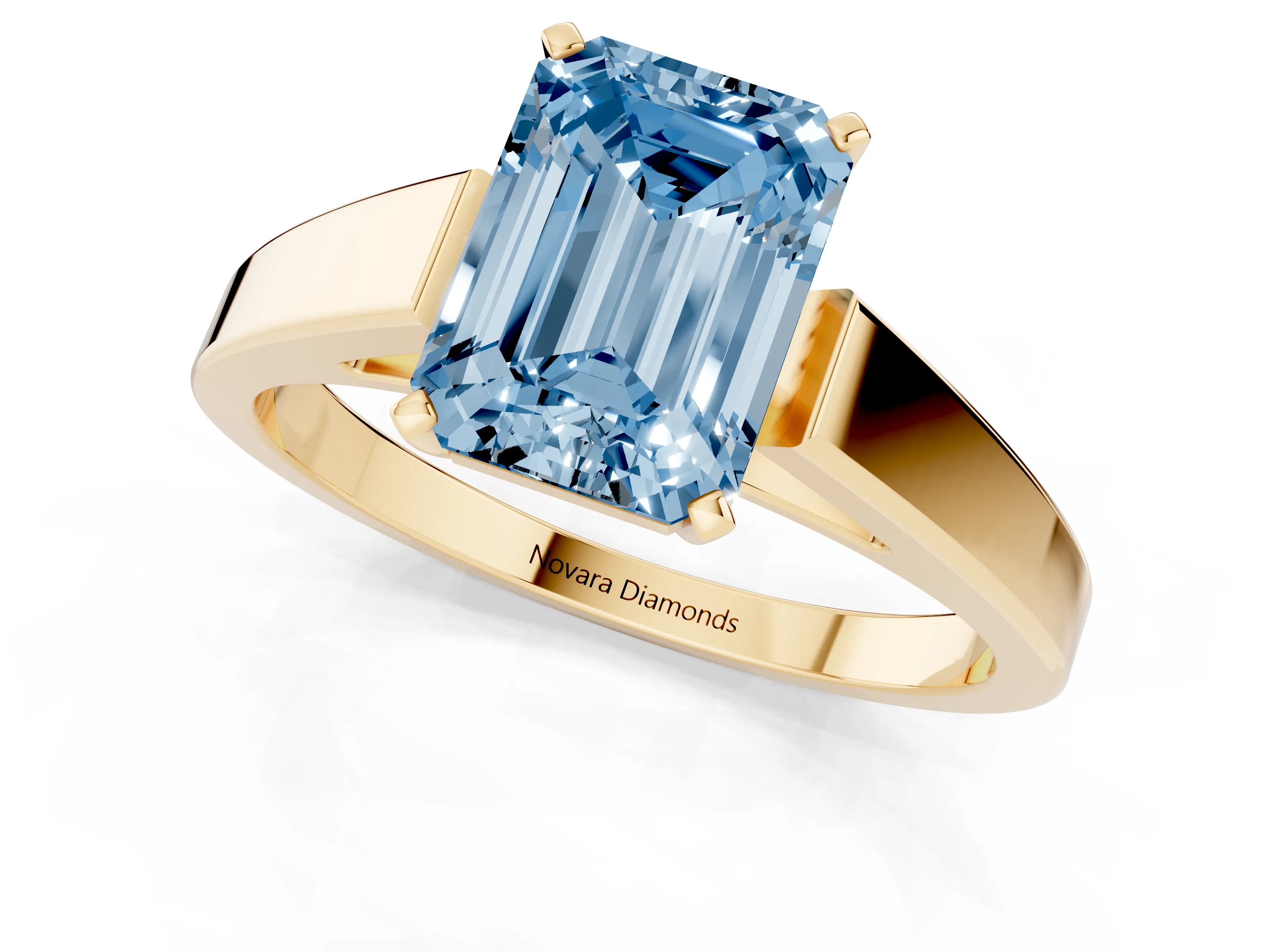Fancy Blue Emerald Cut Diamond Solitaire Engagement Ring Set in Yellow gold with Prong Setting and Tapered Band