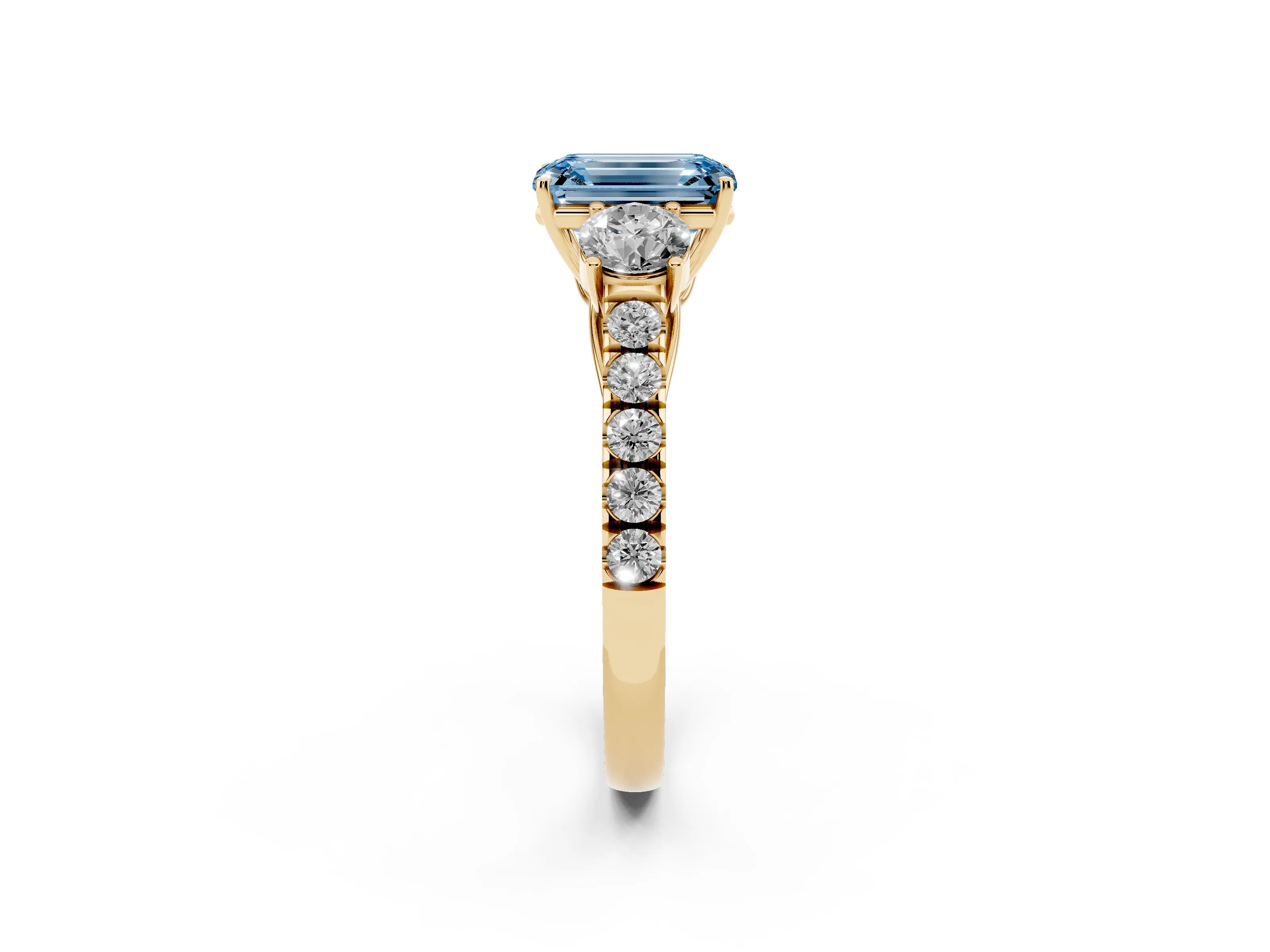 Fancy Blue Emerald Cut Diamond Three-Stone Ring Set in Yellow gold with Round Side Stones and Delicate Pavé Band