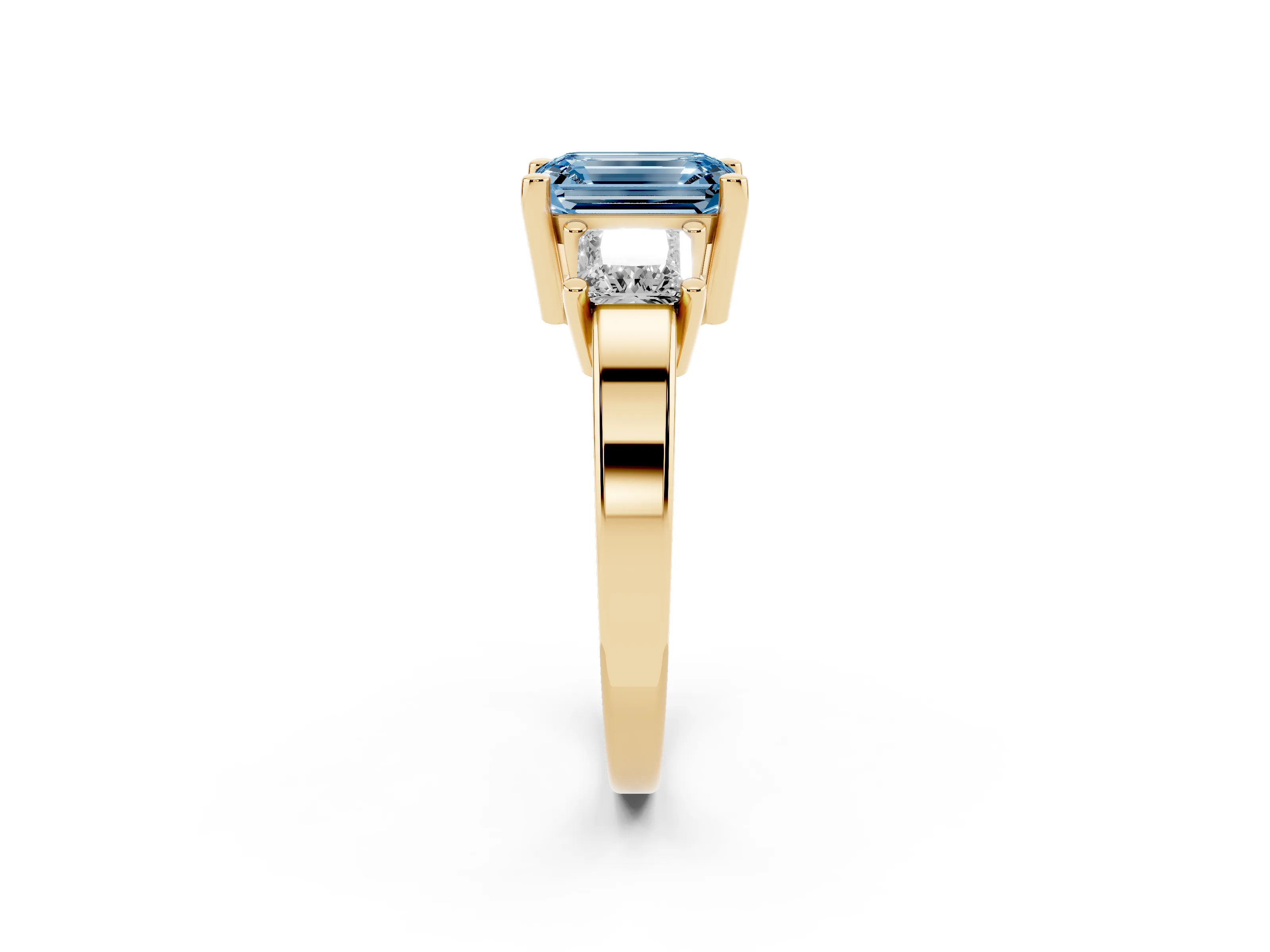 Fancy Blue Three-Stone Emerald Cut Diamond Solitaire Ring Set in Yellow gold with Prong Setting