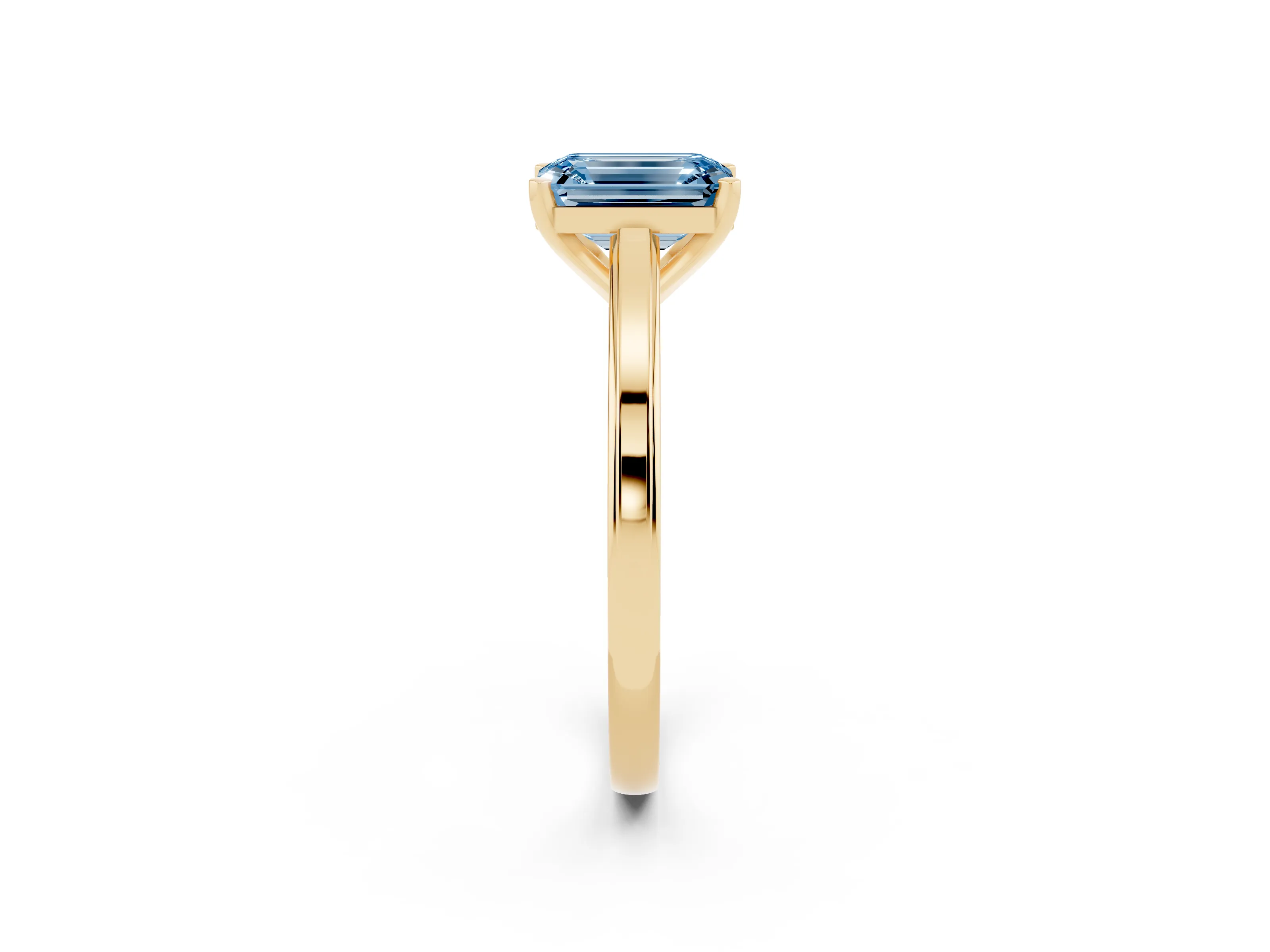 Fancy Blue Emerald Cut Diamond Solitaire Ring Set in Yellow gold with Prong Setting and Classic Band