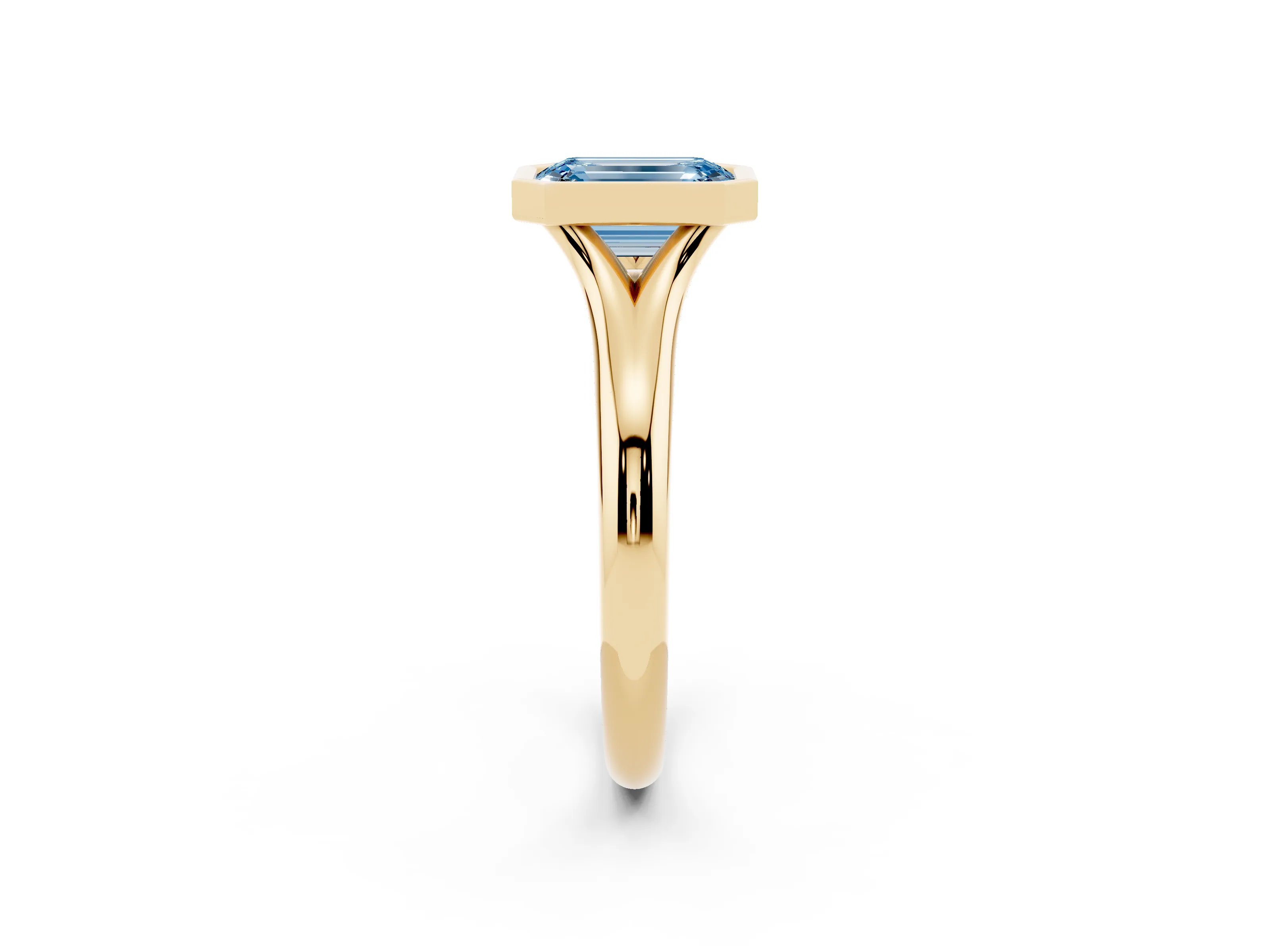 Fancy Blue Bezel Set Emerald Cut Diamond Solitaire Ring Set in Yellow gold with Smooth Band