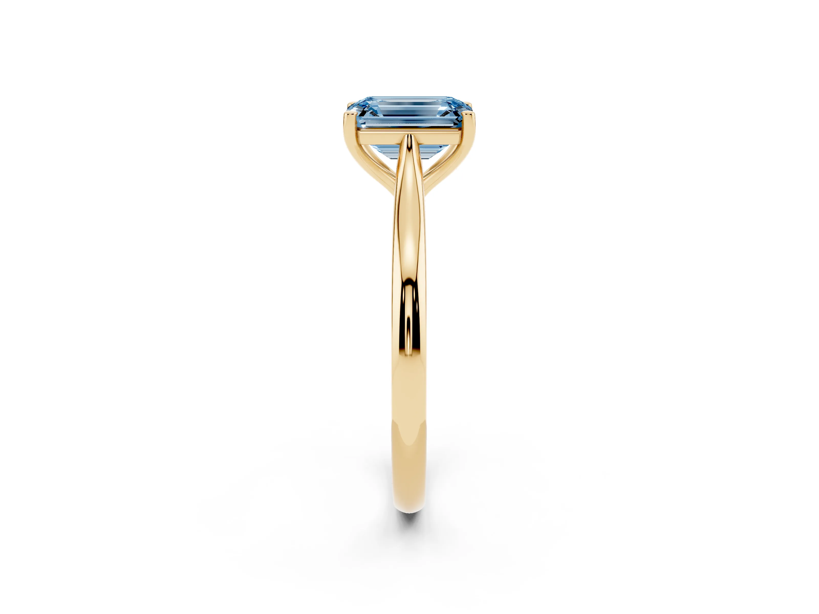 Fancy Blue Emerald Cut Diamond Solitaire Ring Set in Yellow gold with Cathedral Band and Prong Setting