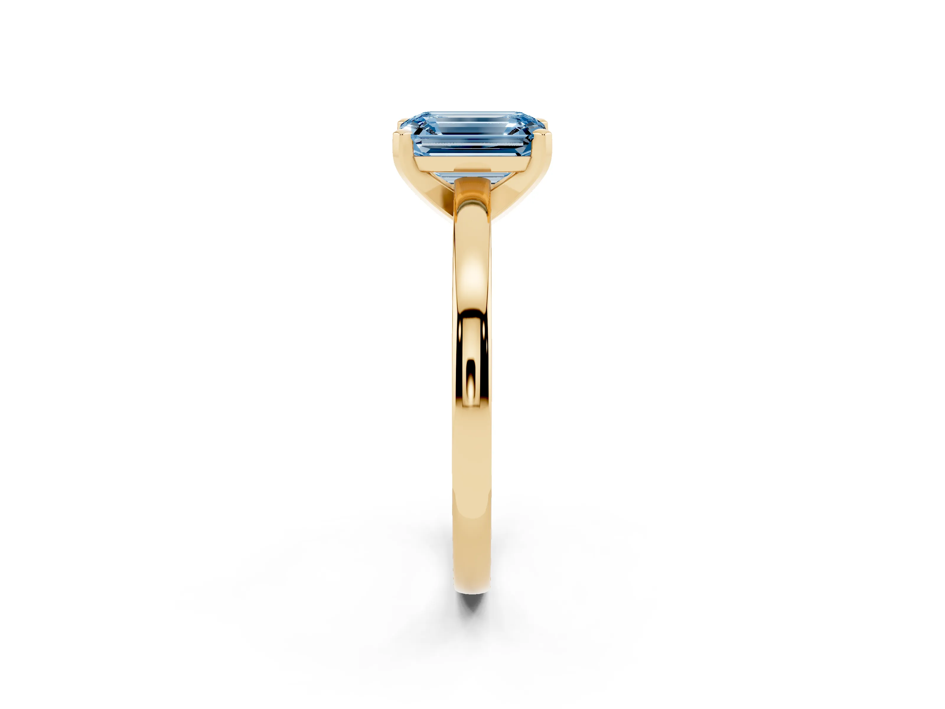 Fancy Blue Emerald Cut Diamond Solitaire Engagement Ring Set in Yellow gold with Prong Setting on a Classic Band