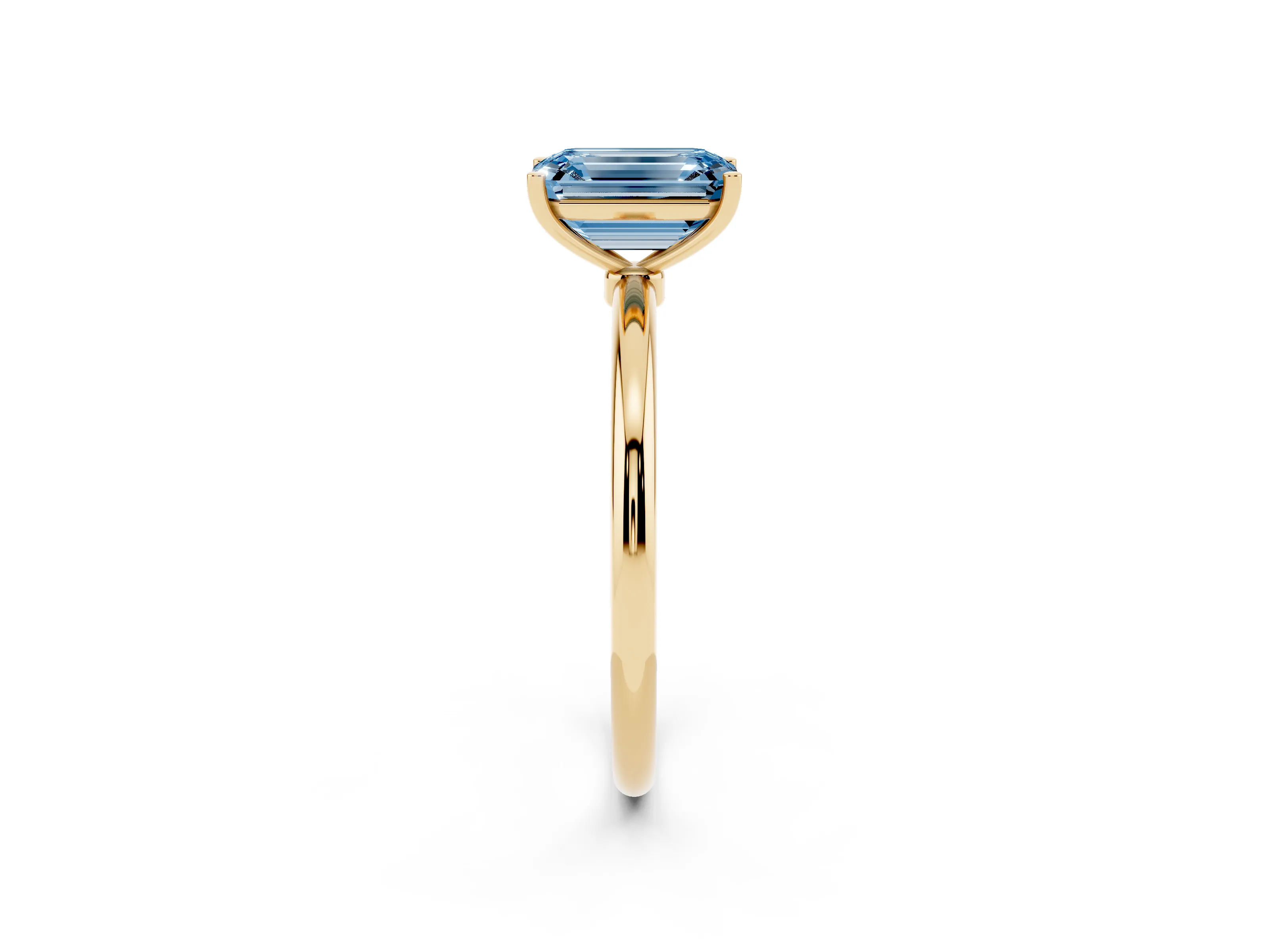Fancy Blue Emerald Cut Diamond Solitaire Engagement Ring Set in Yellow gold with Thin Band and Prong Setting