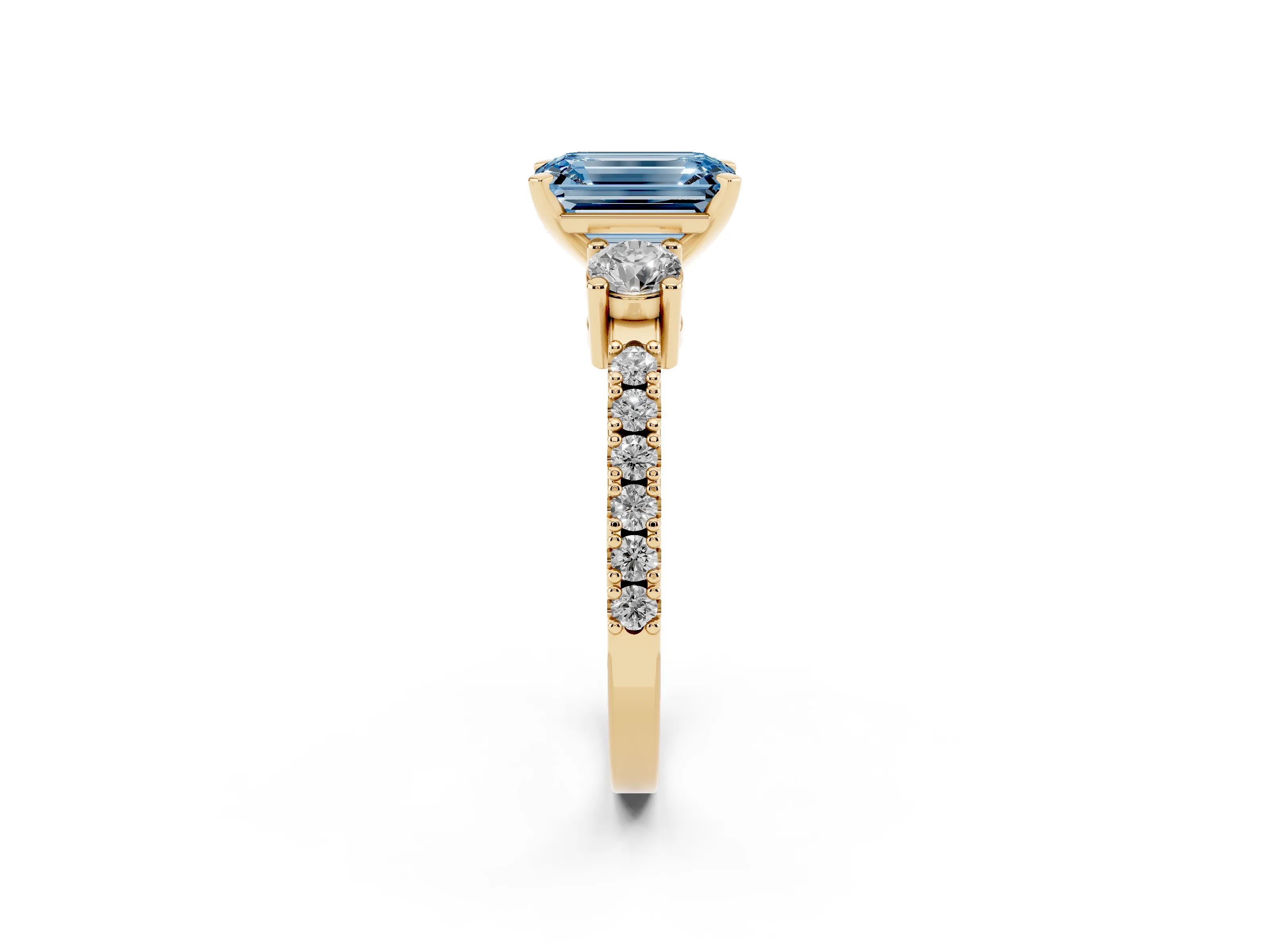 Fancy Blue Three-Stone Emerald Cut Diamond Pavé Band Ring Set in Yellow gold with Prong Setting
