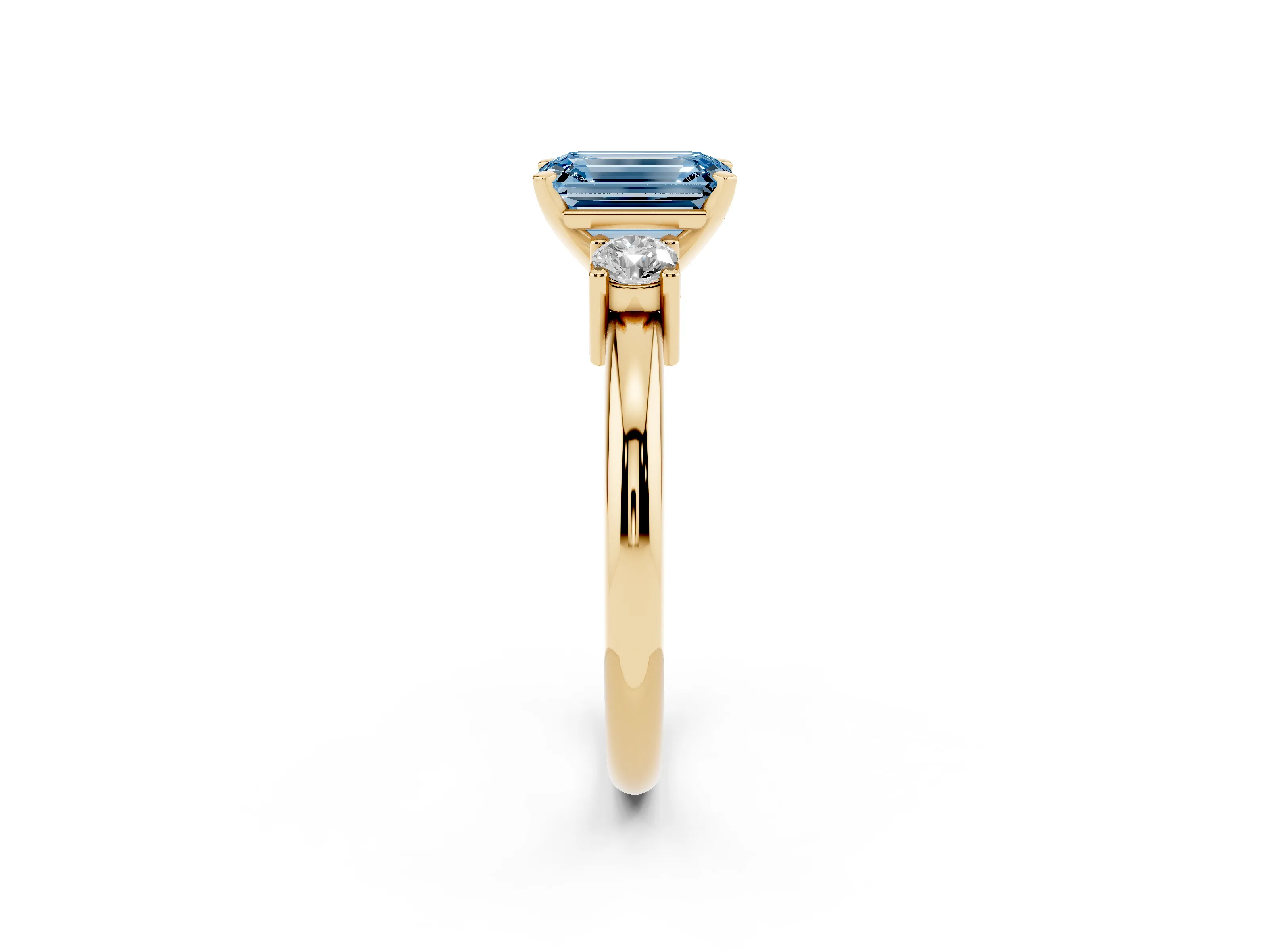 Fancy Blue Three-Stone Emerald Cut Diamond Ring Set in Yellow gold with Prong Setting and Plain Band