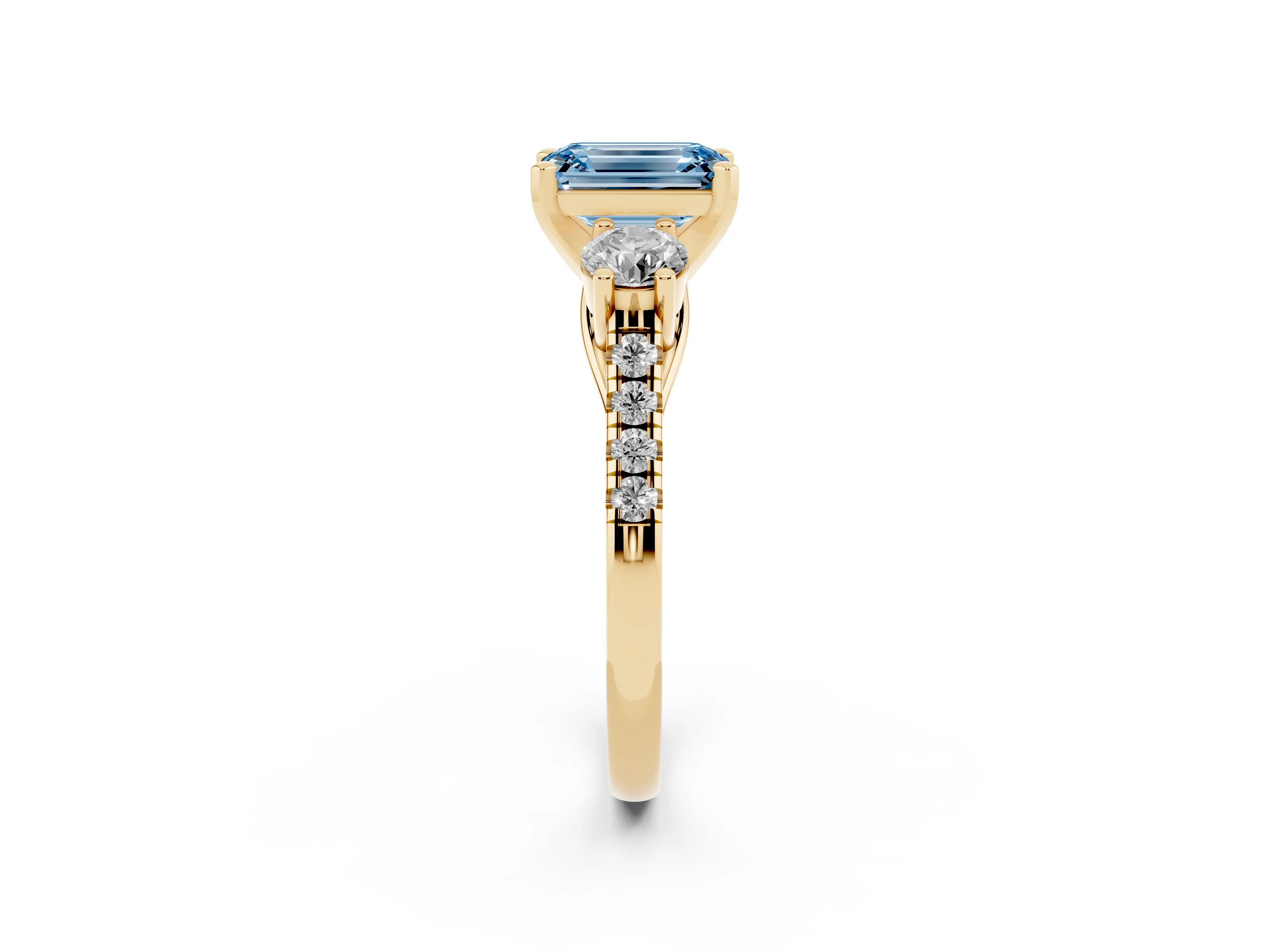 Fancy Blue Three-Stone Emerald Cut Diamond Pavé Band Ring Set in Yellow gold with Prong-Set Trio