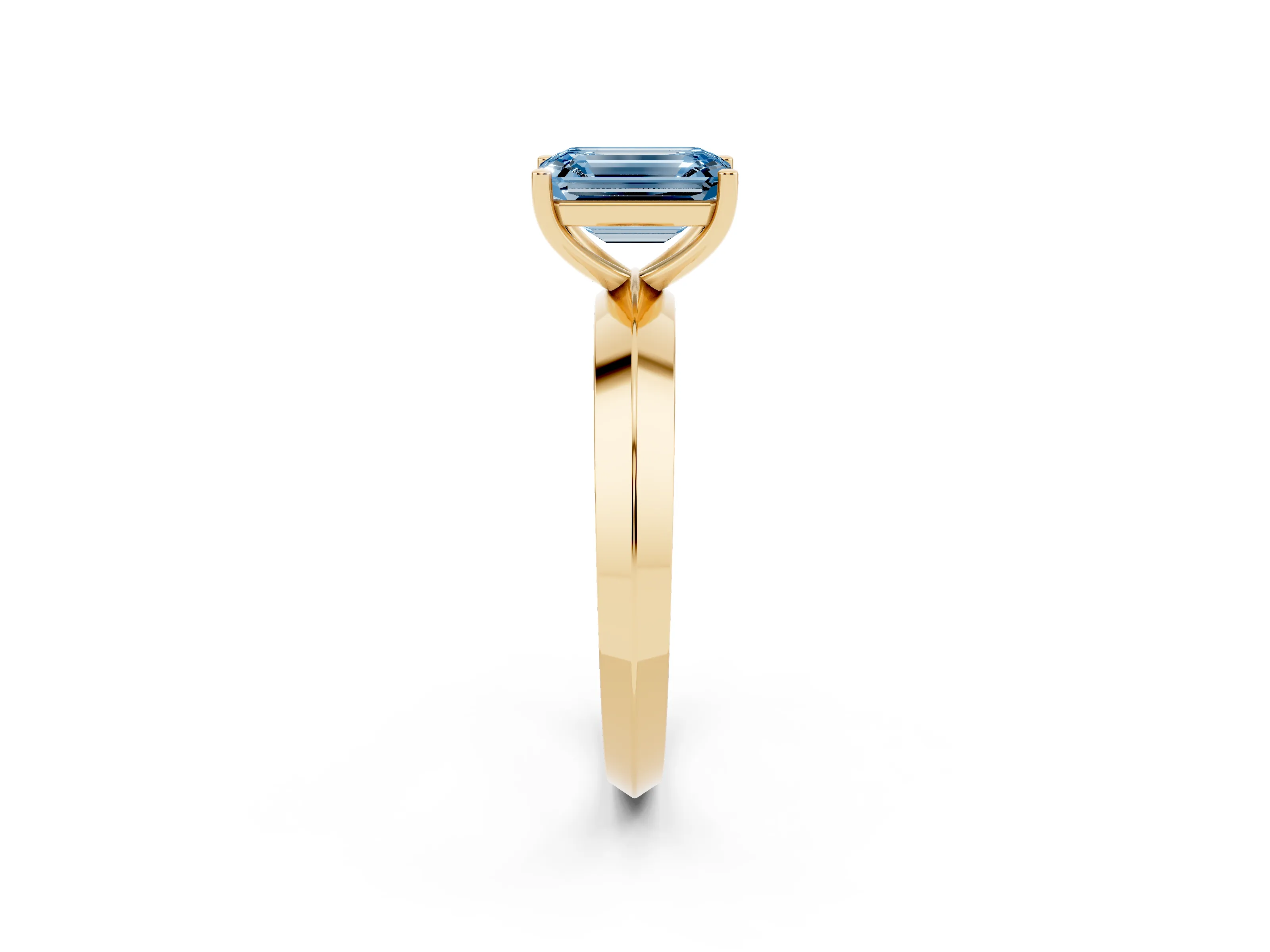 Fancy Blue Emerald Cut Diamond Solitaire Engagement Ring Set in Yellow gold with Flat Band and Prong Setting