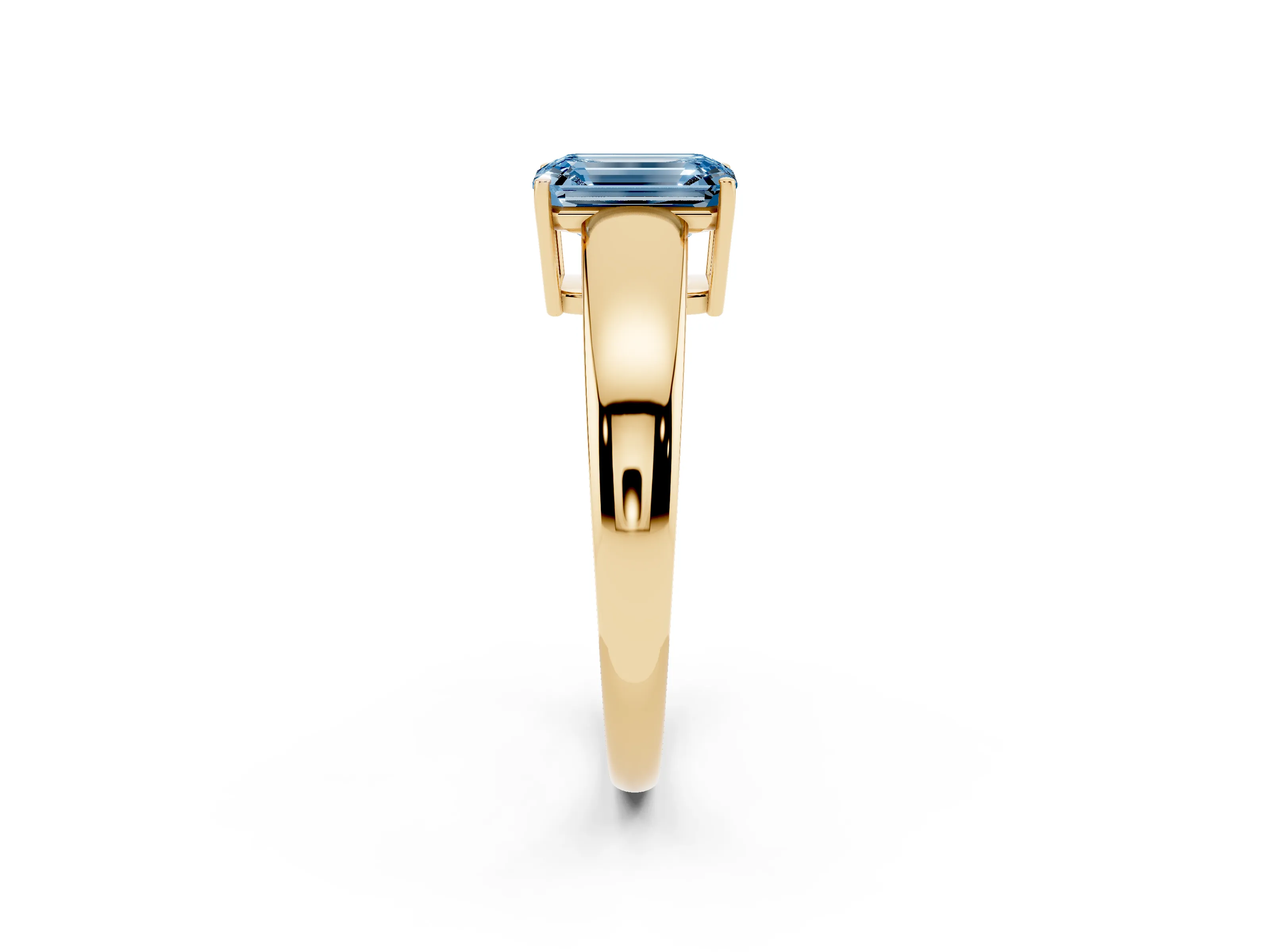 Fancy Blue Emerald Cut Diamond Solitaire Ring Set in Yellow gold with Tapered Band and Prong Setting