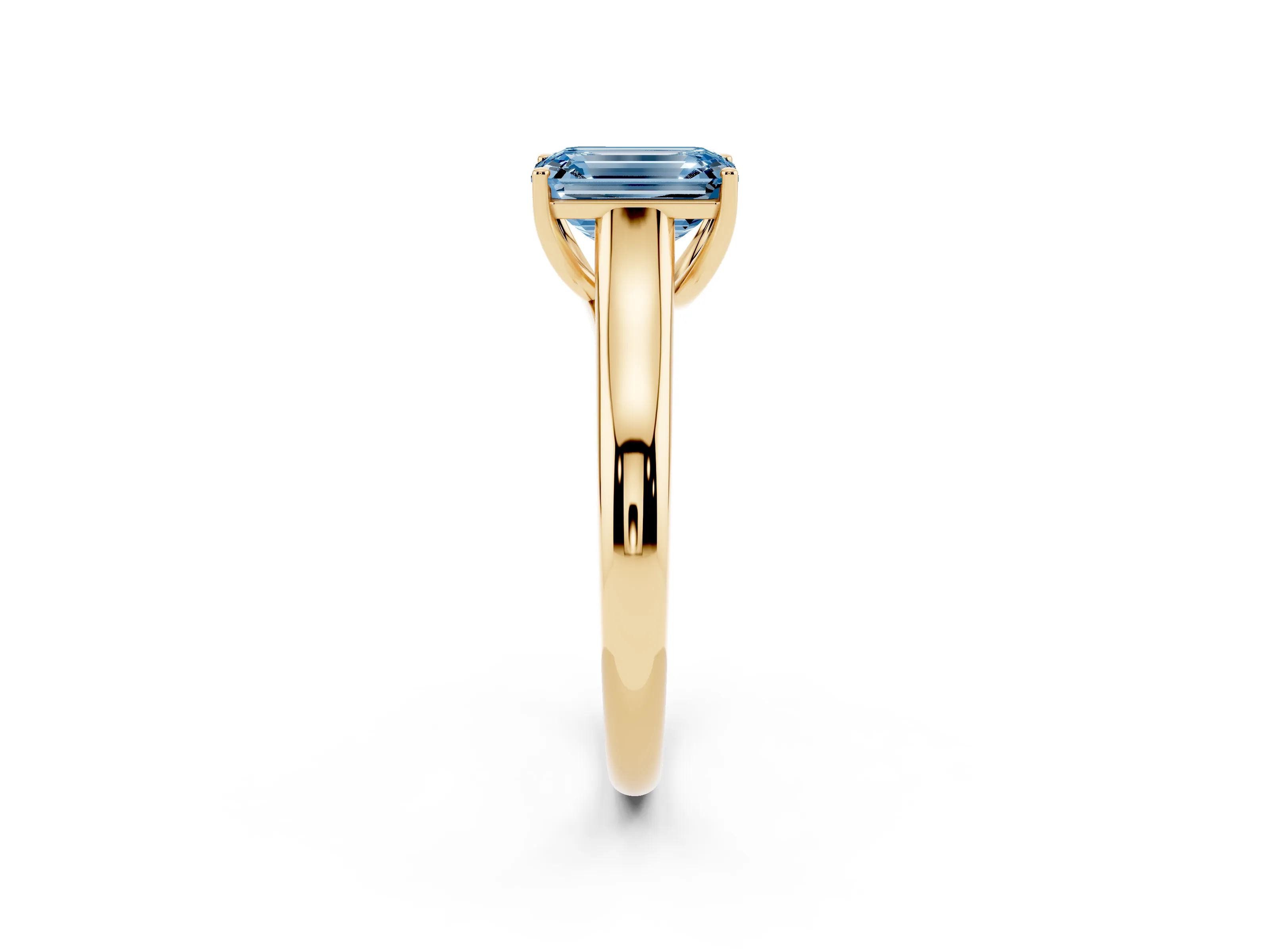 Fancy Blue Emerald Cut Diamond Solitaire Engagement Ring Set in Yellow gold with Subtly Tapered Band and Prong Setting