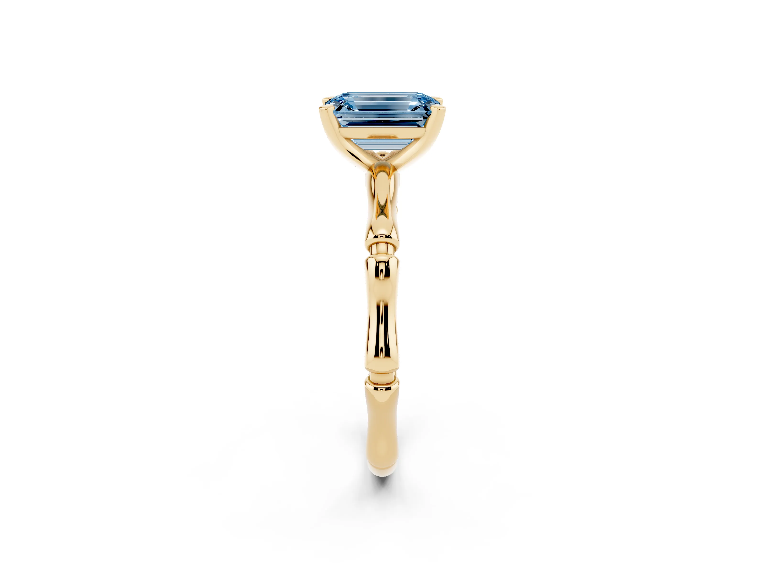 Fancy Blue Emerald Cut Diamond Solitaire Ring Set in Yellow gold with Bamboo Band and Prong Setting