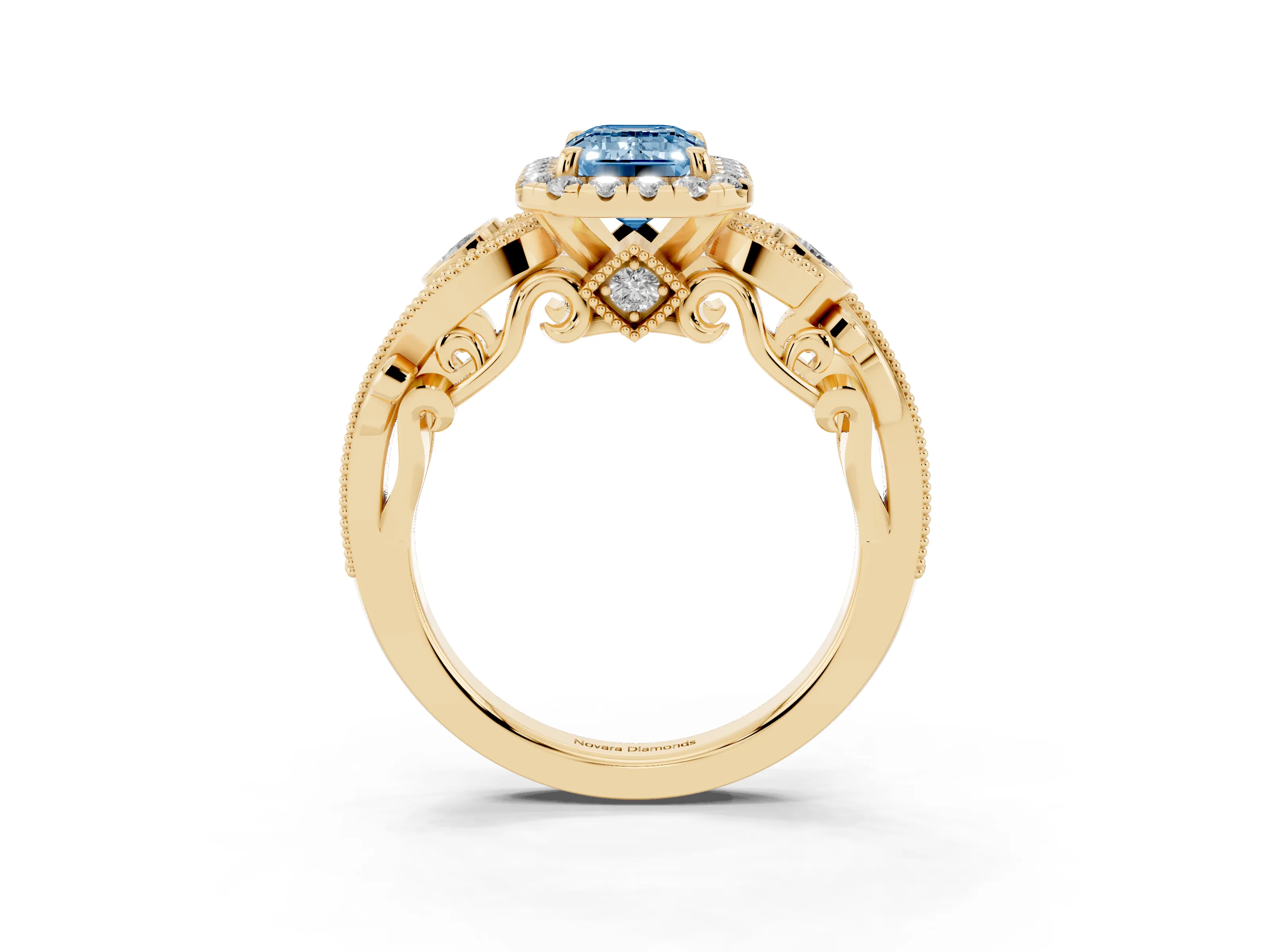 Fancy Blue Emerald Cut Diamond Halo Ring Set in Yellow gold with Milgrain Pavé Band and Prong Setting