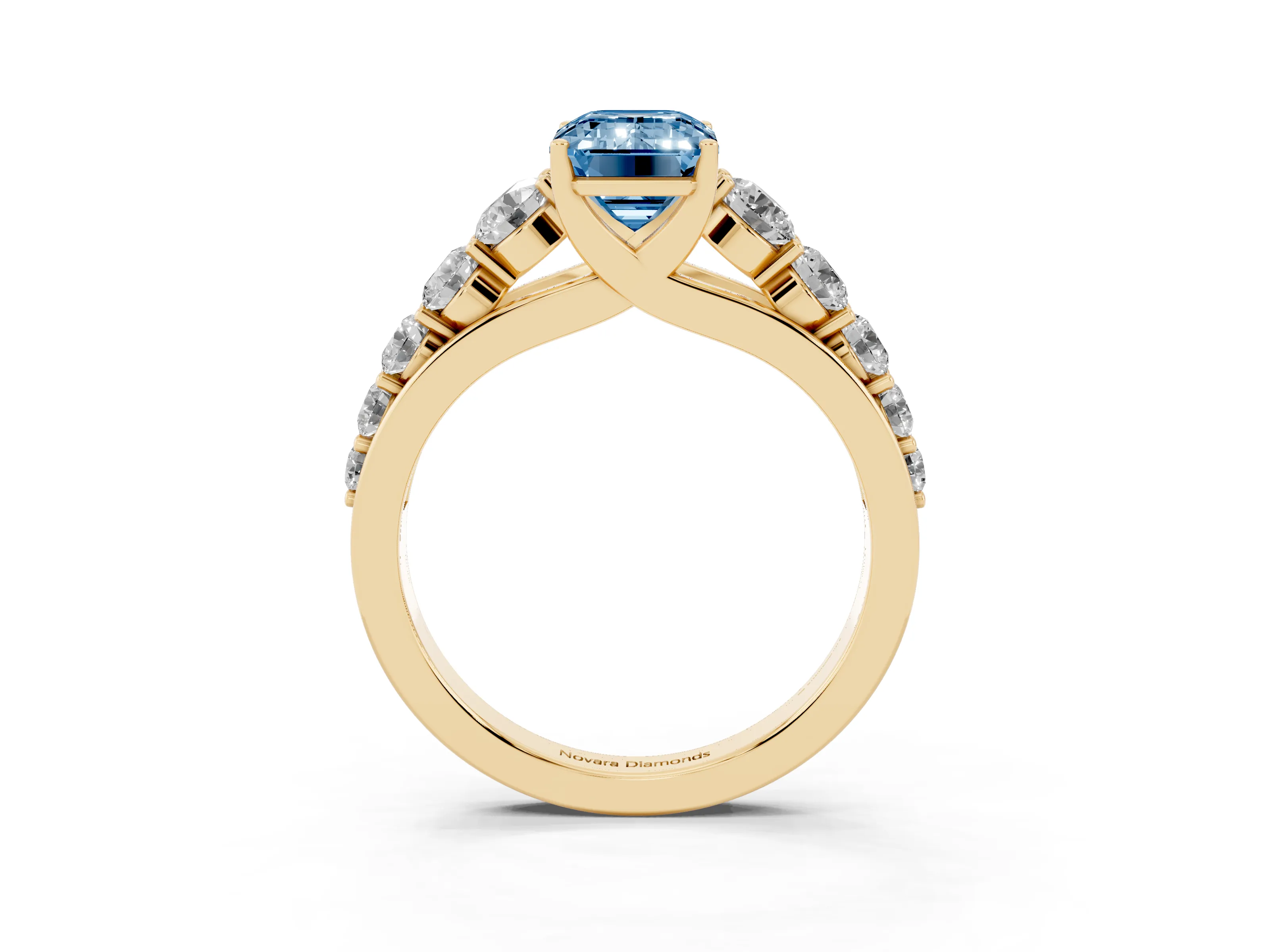 Fancy Blue Emerald Cut Diamond Solitaire Ring Set in Yellow gold with Pavé-Set Band and Prong Setting
