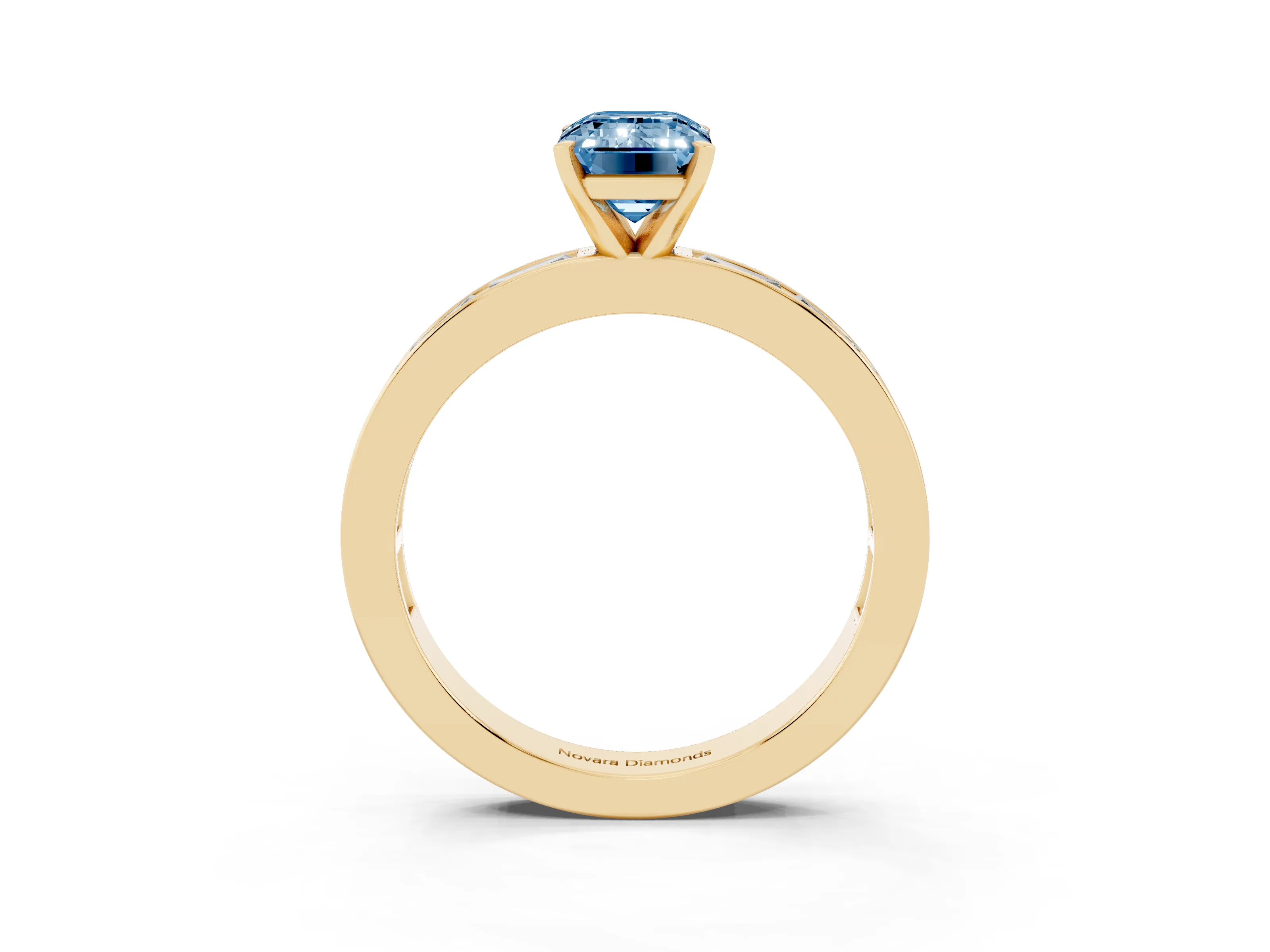 Fancy Blue Emerald Cut Diamond Solitaire Ring Set in Yellow gold with Channel-Set Baguette Band and Prong Setting