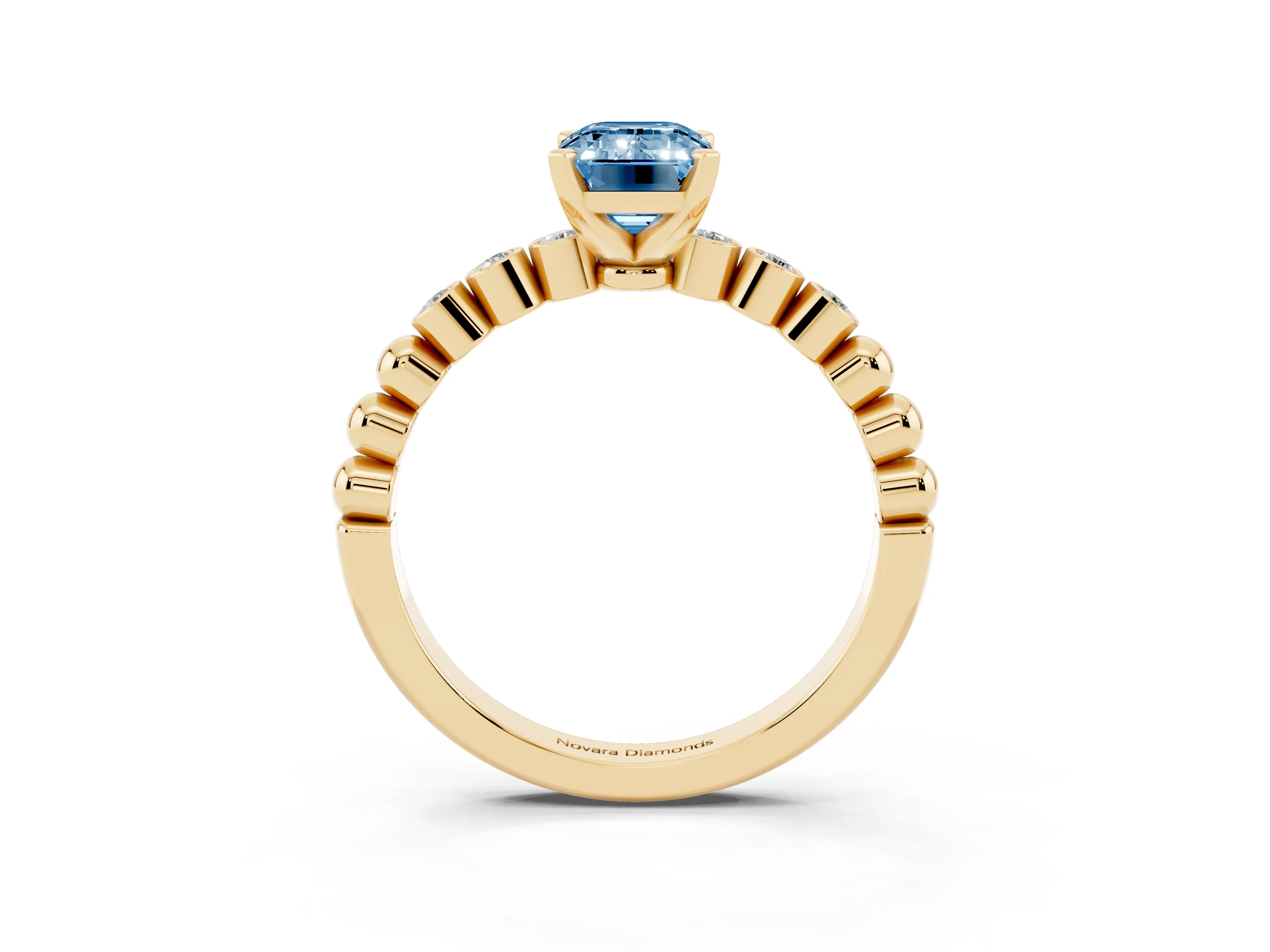 Fancy Blue Emerald Cut Diamond Solitaire Engagement Ring Set in Yellow gold with Bezel Accents on Beaded Band