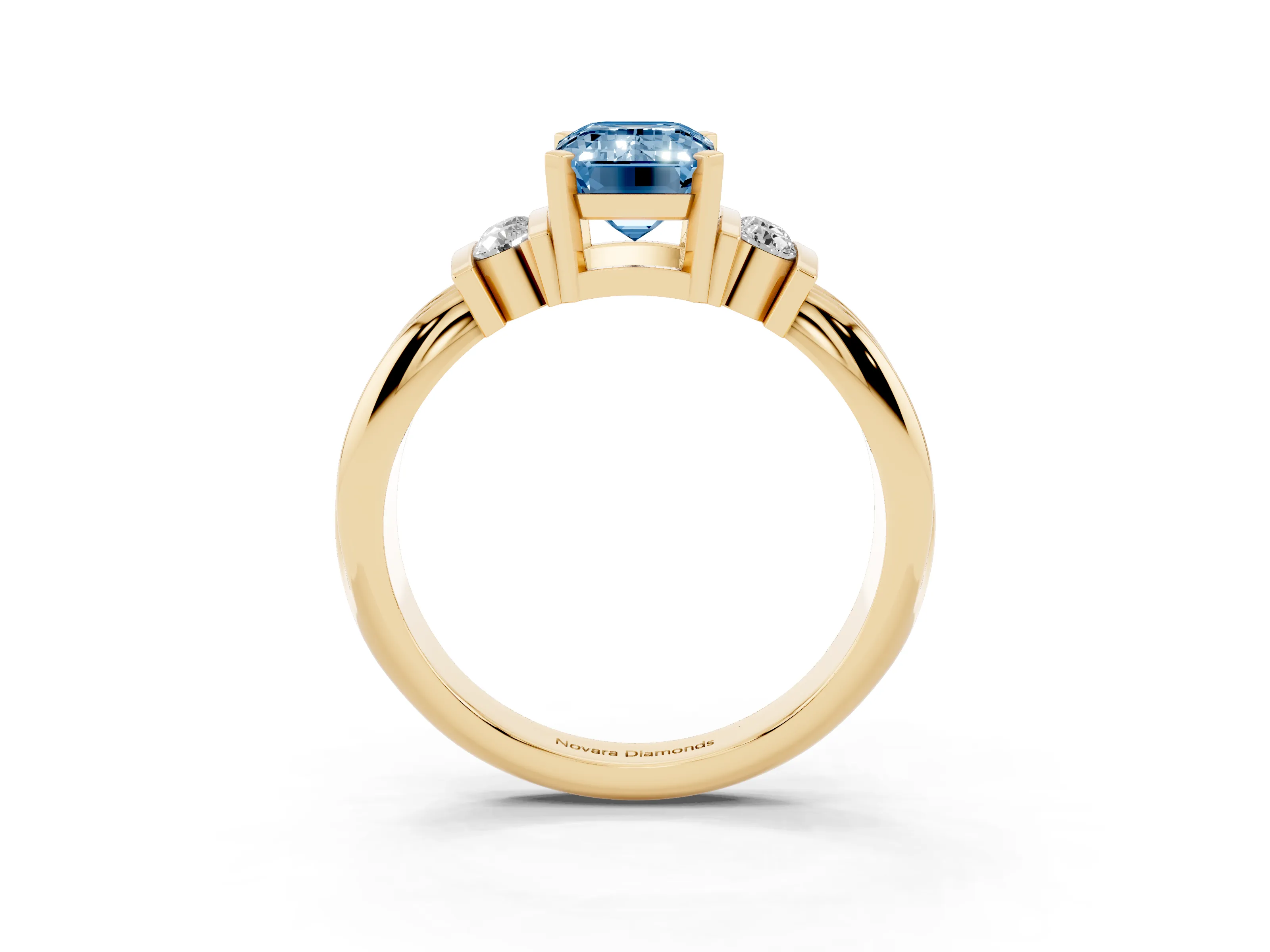 Fancy Blue Three-Stone Emerald Cut Diamond Channel Set Ring Set in Yellow gold with Bar Prongs