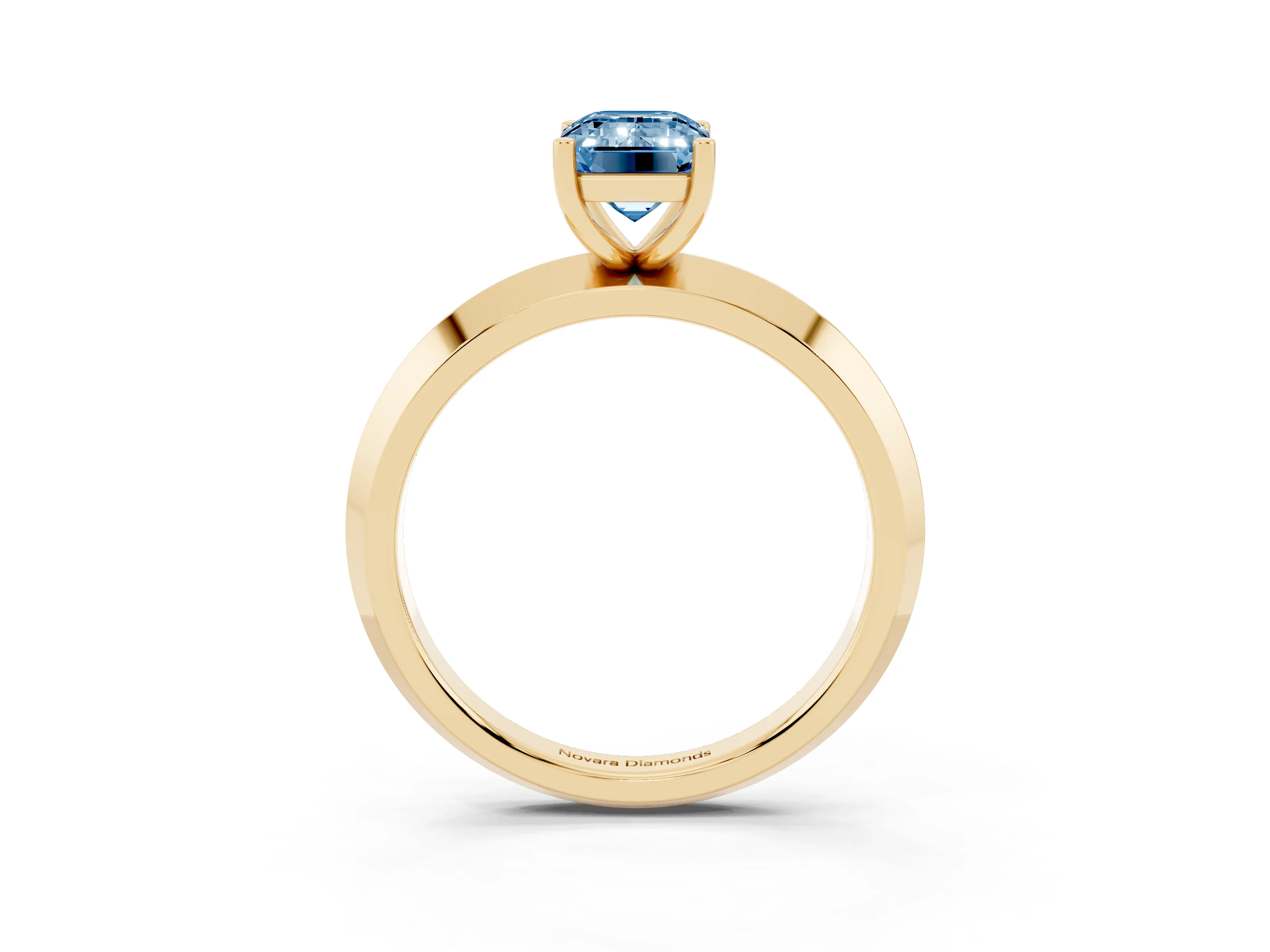 Fancy Blue Emerald Cut Diamond Solitaire Engagement Ring Set in Yellow gold with Flat Band and Prong Setting