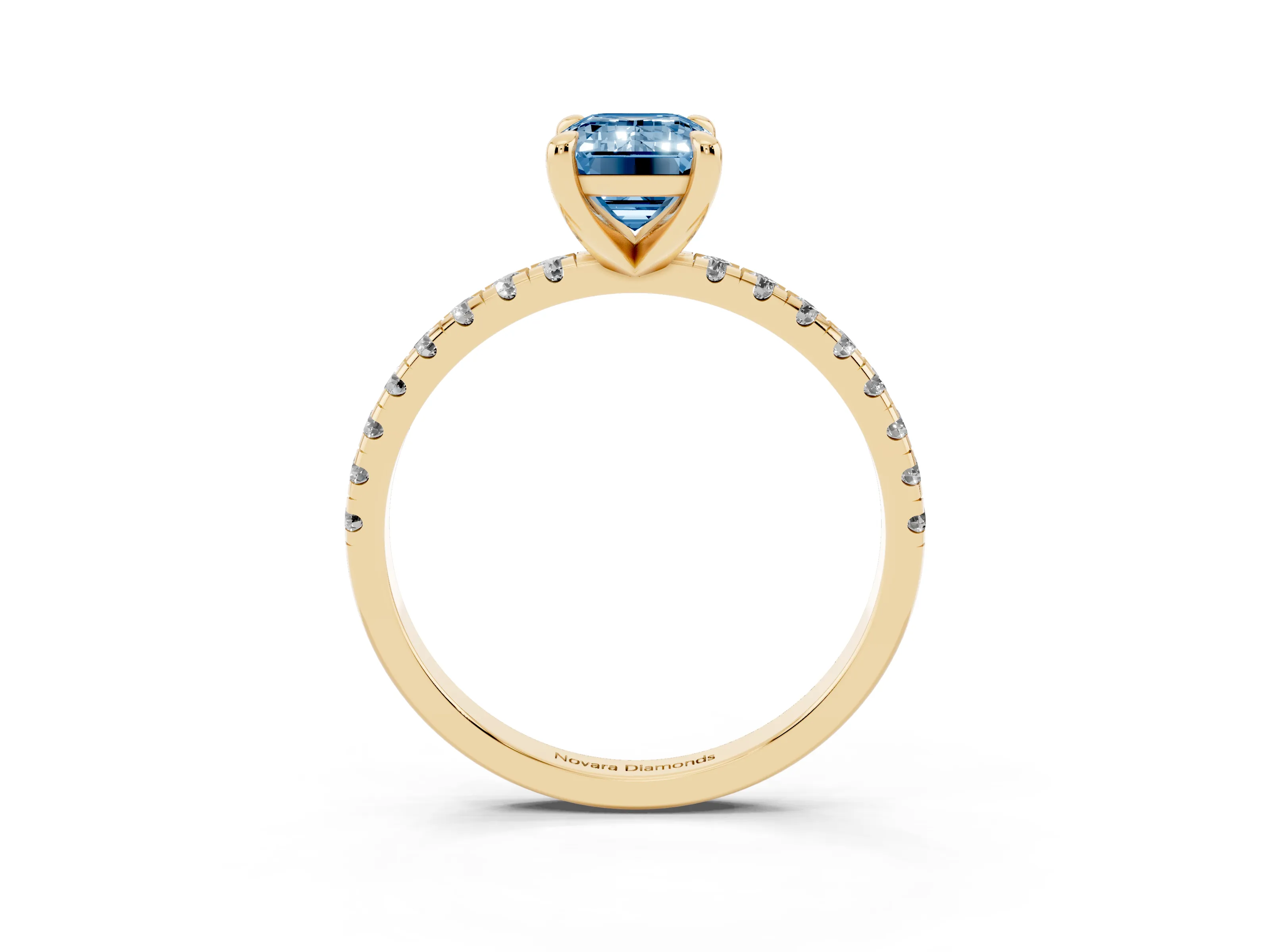Fancy Blue Emerald Cut Diamond Brilliant Solitaire Ring Set in Yellow gold with Pavé Band and Prong Setting